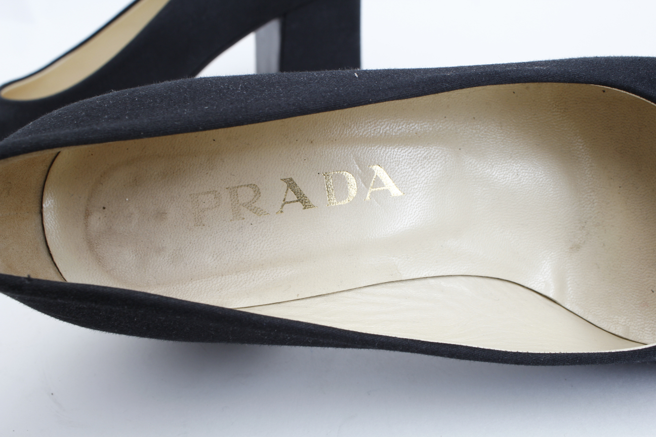Women's Black Prada and Ferragamo Pumps