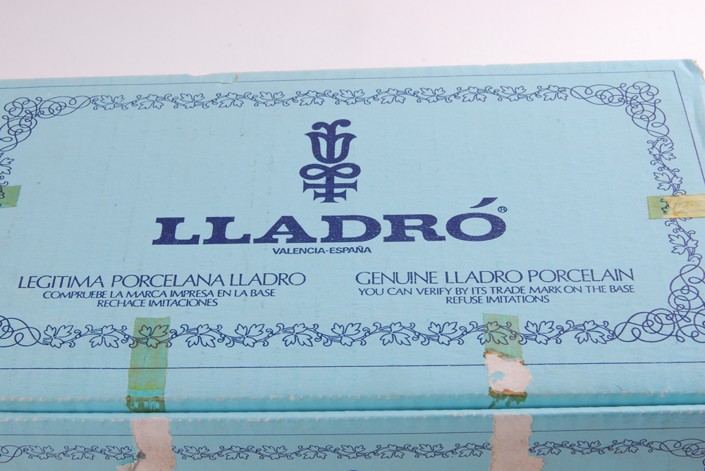 Lladro "Land of the Giants Girl , Apple, Butterfly" Figurine