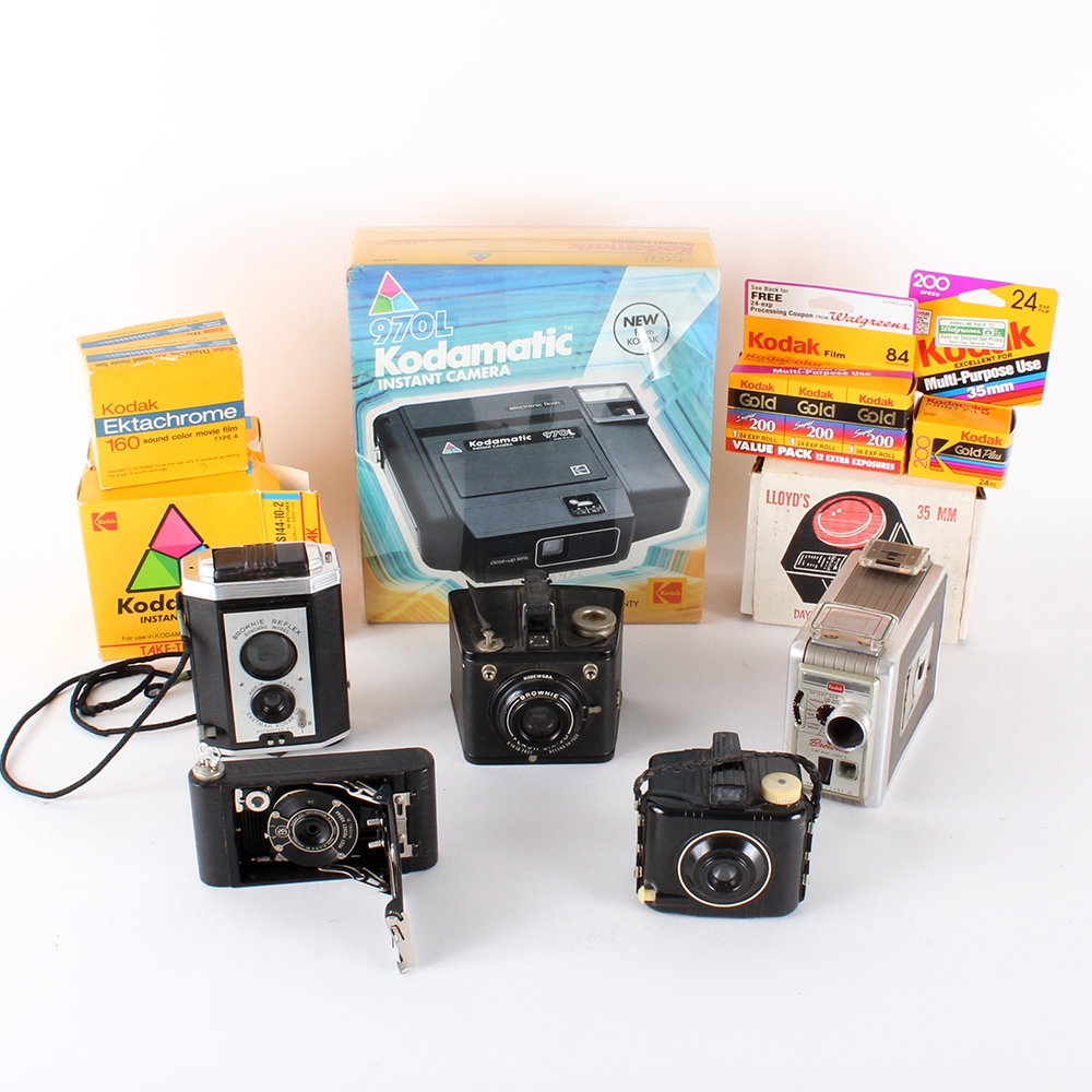 Collection of Vintage Kodak Cameras, Film, and Lloyd's Daylight Loader