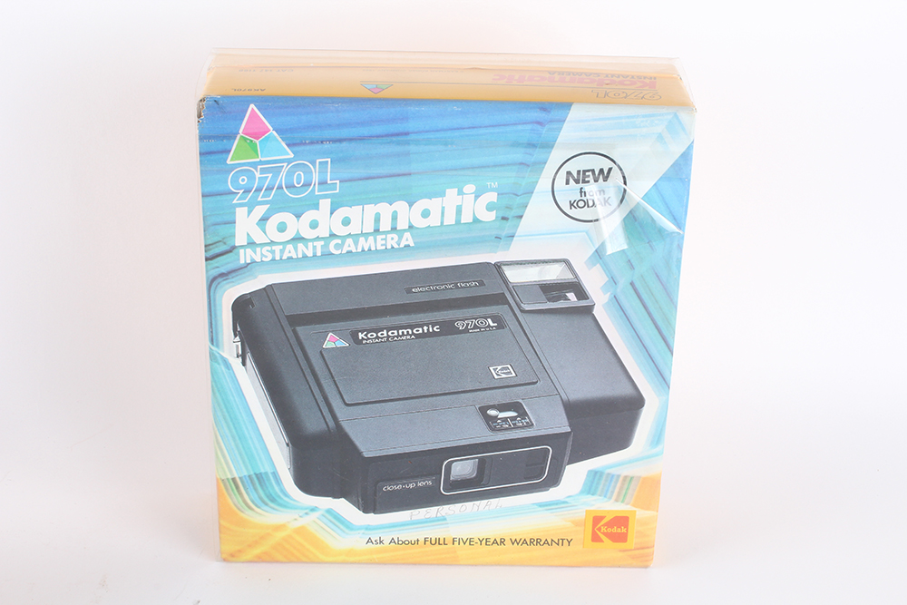 Collection of Vintage Kodak Cameras, Film, and Lloyd's Daylight Loader