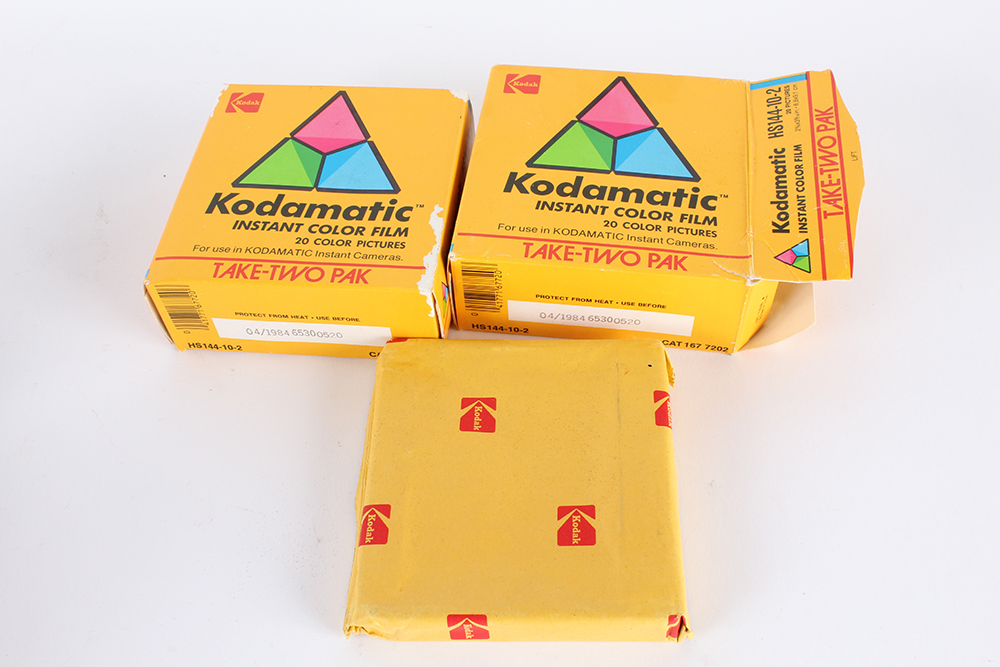 Collection of Vintage Kodak Cameras, Film, and Lloyd's Daylight Loader