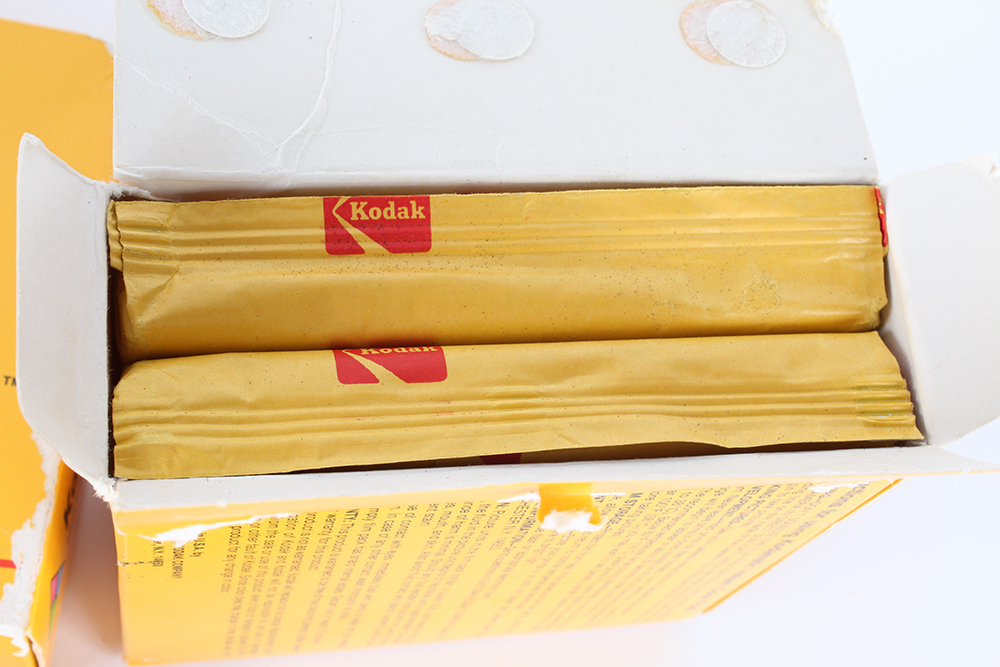 Collection of Vintage Kodak Cameras, Film, and Lloyd's Daylight Loader