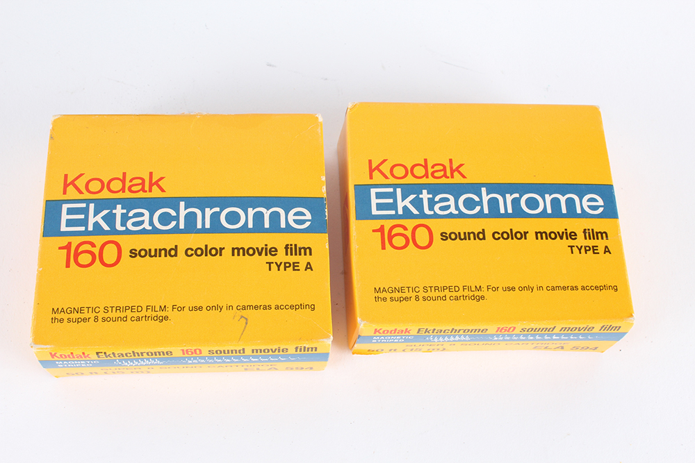 Collection of Vintage Kodak Cameras, Film, and Lloyd's Daylight Loader