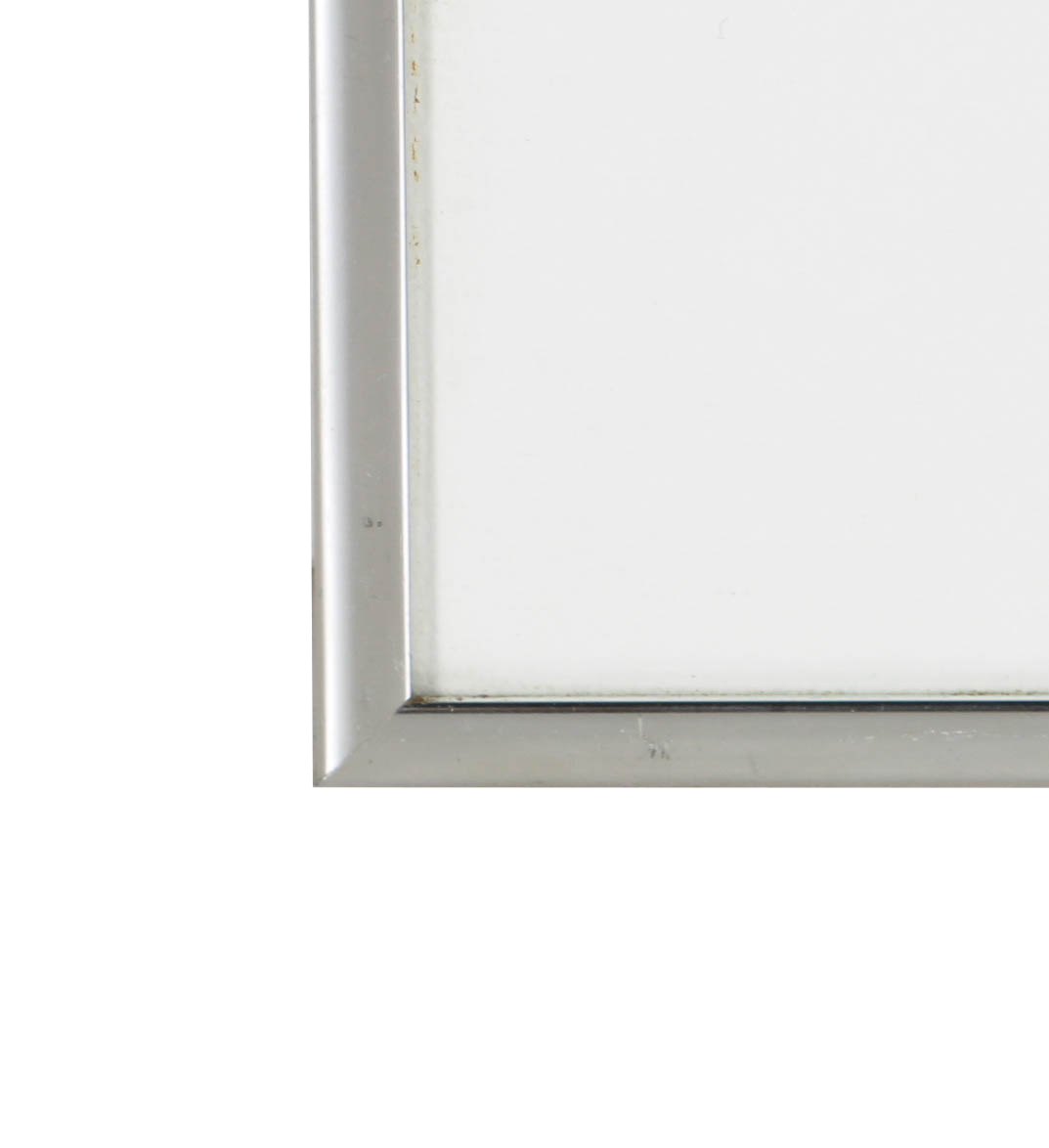 Black and White Photograph of a Nude Figure Under an Arch