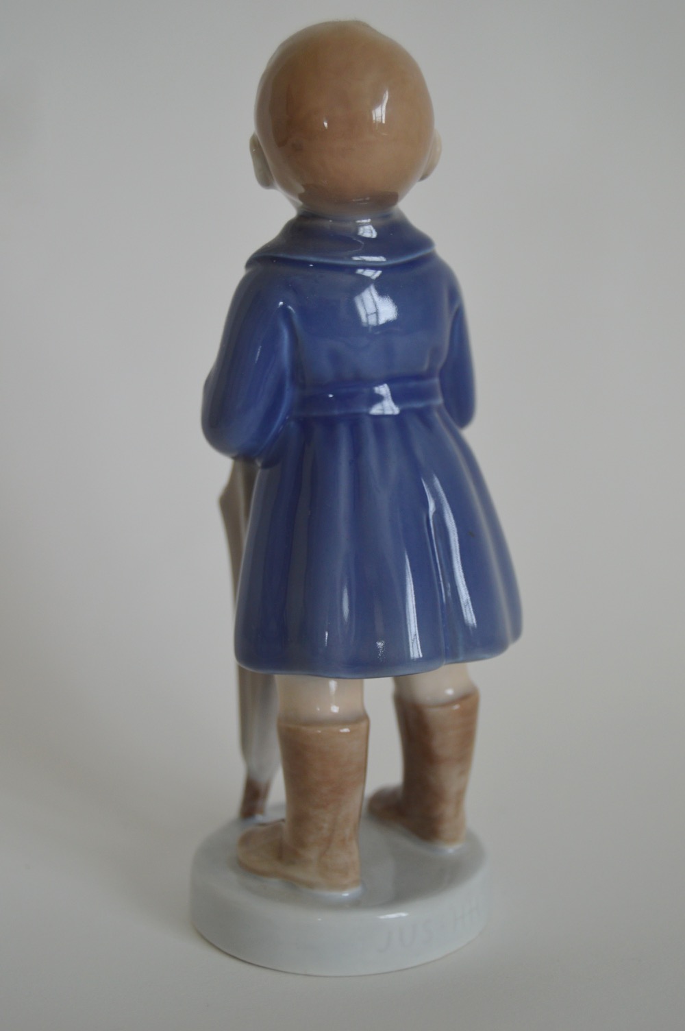 Royal Copenhagen Denmark "April, Boy With Umbrella" Figurine