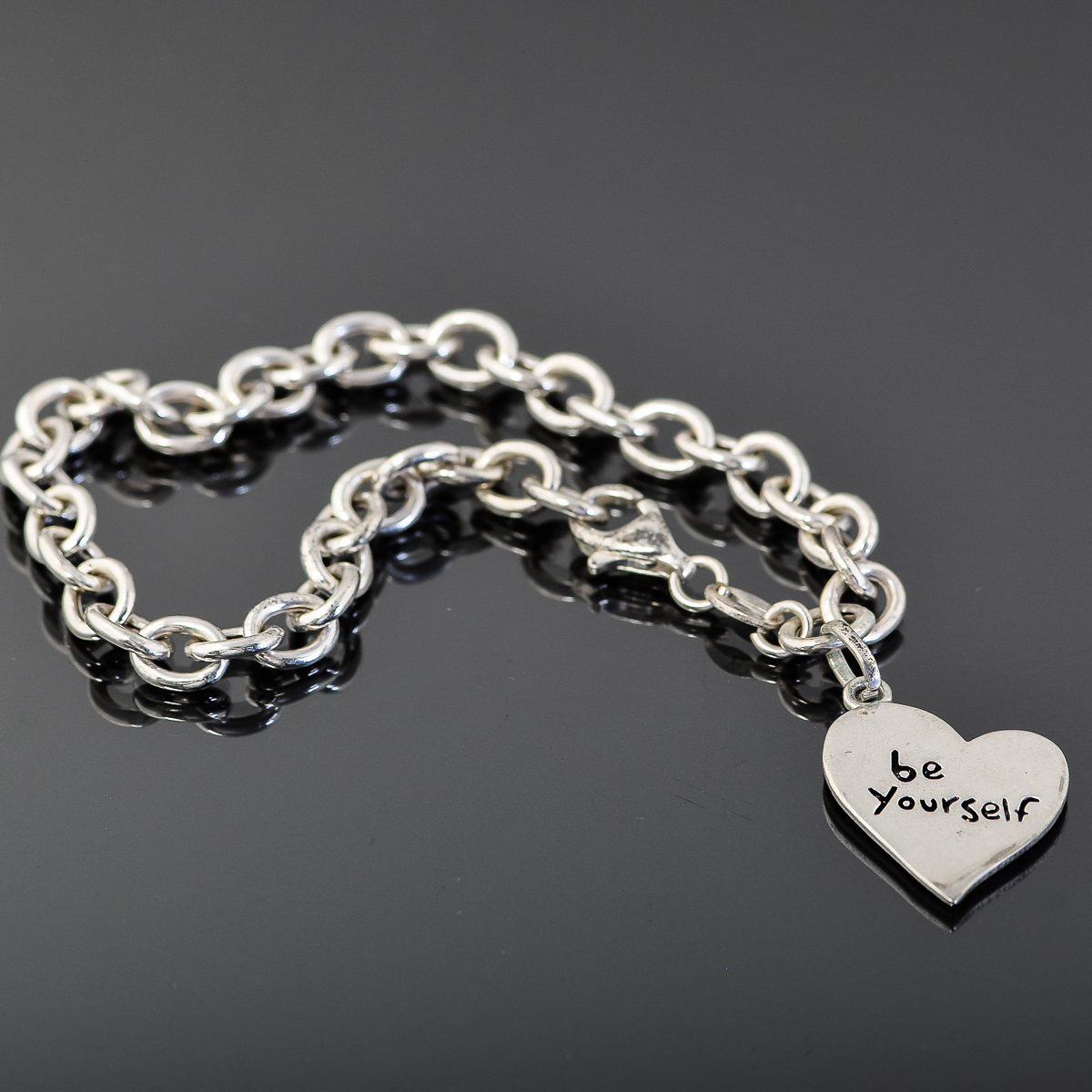 Sterling Silver Bracelet with Heart Charm