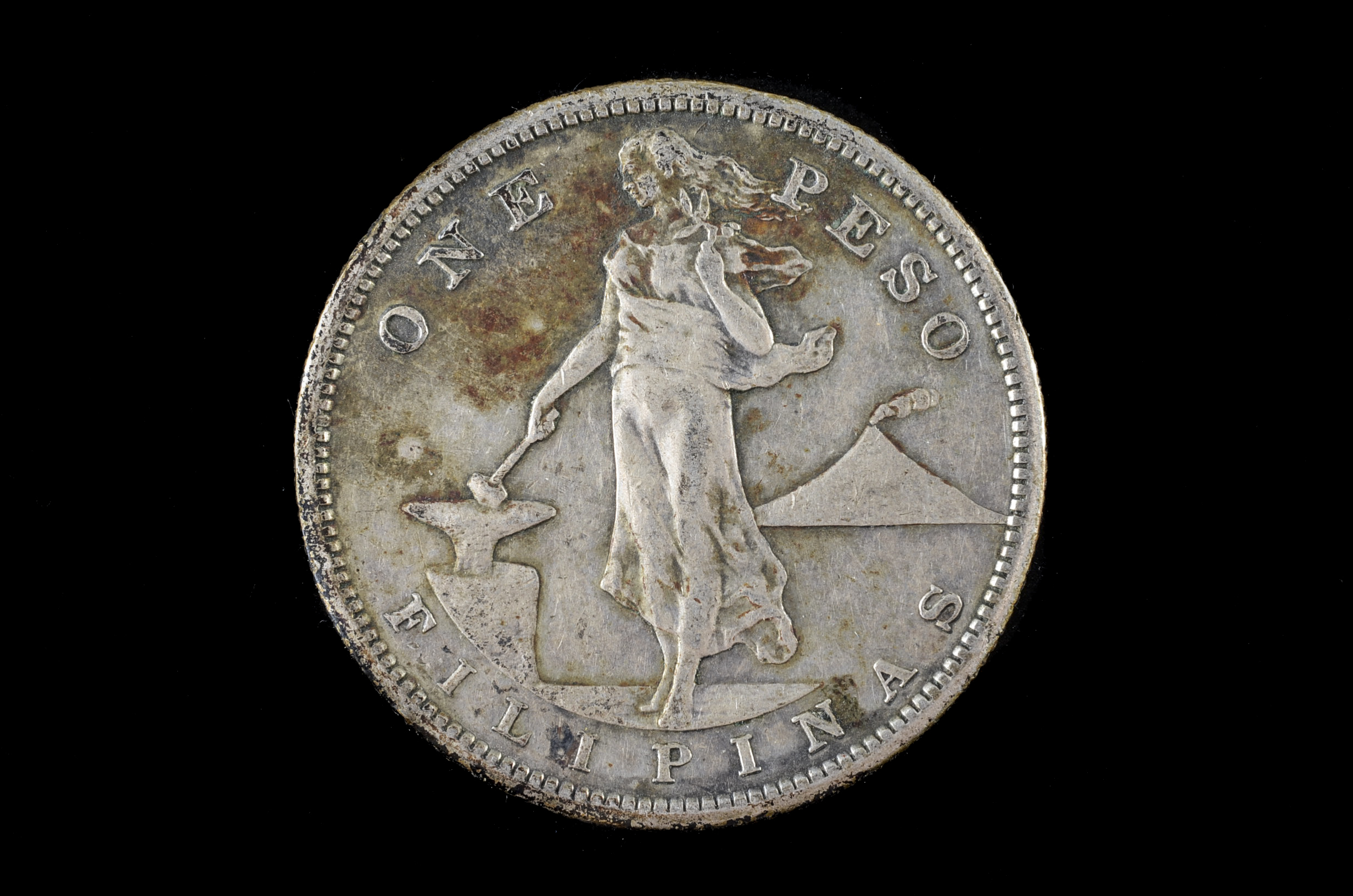 1909 S One Peso and 1944 Fifty Centavos Filipinas Silver Coins