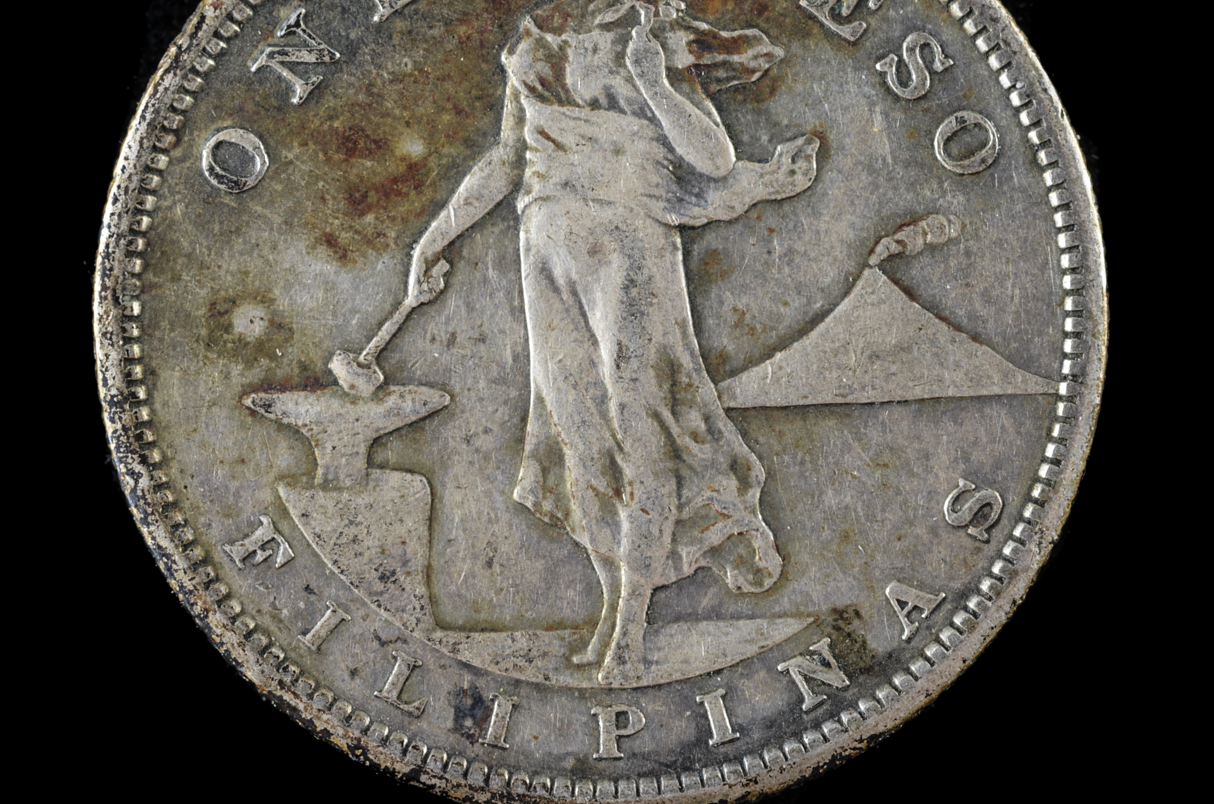 1909 S One Peso and 1944 Fifty Centavos Filipinas Silver Coins