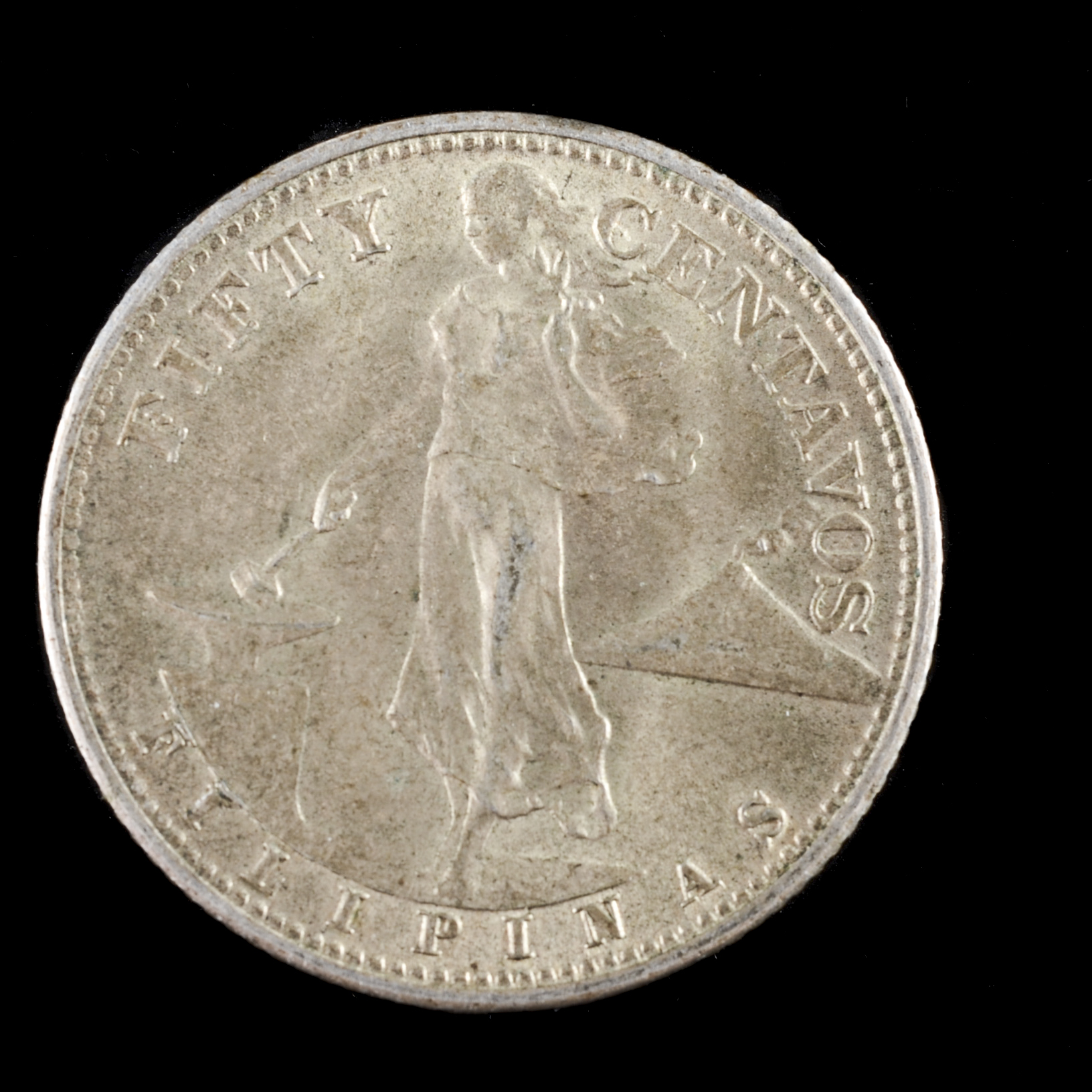 1909 S One Peso and 1944 Fifty Centavos Filipinas Silver Coins