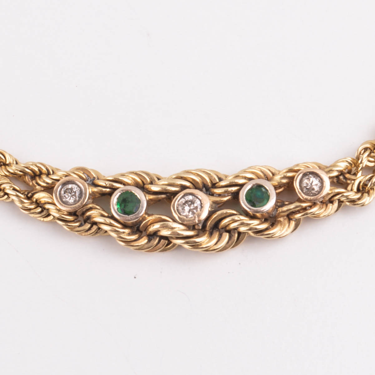14k Yellow Gold Braided Bracelet with Diamonds and Emeralds