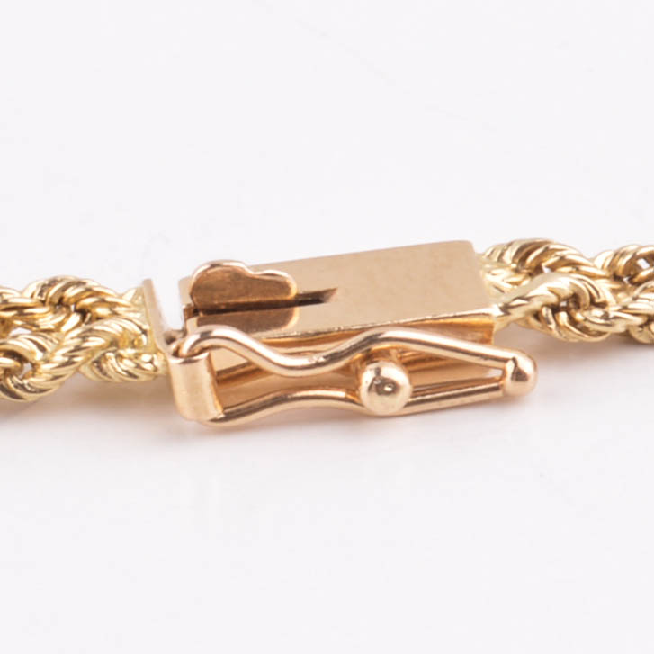 14k Yellow Gold Braided Bracelet with Diamonds and Emeralds