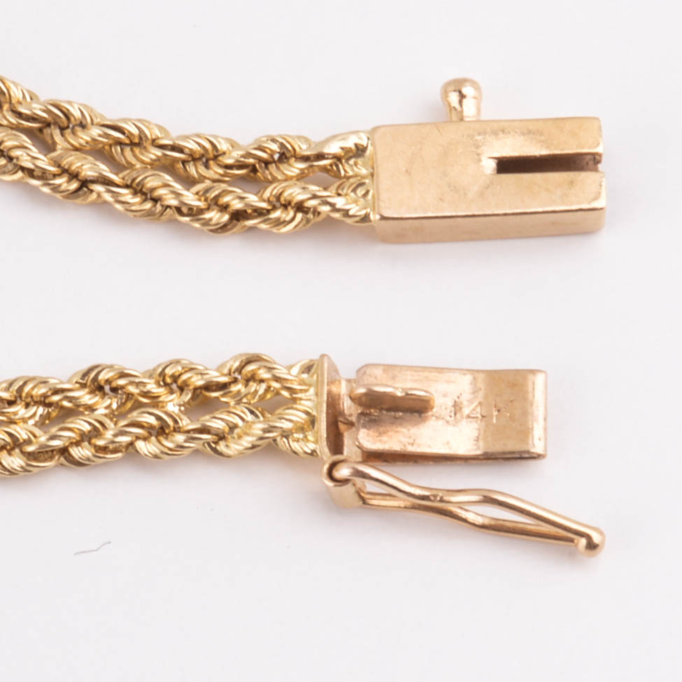 14k Yellow Gold Braided Bracelet with Diamonds and Emeralds