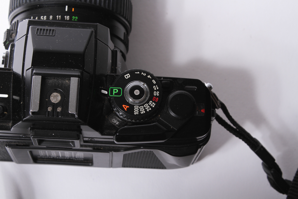 Minolta X-700 SLR Camera With Tripod