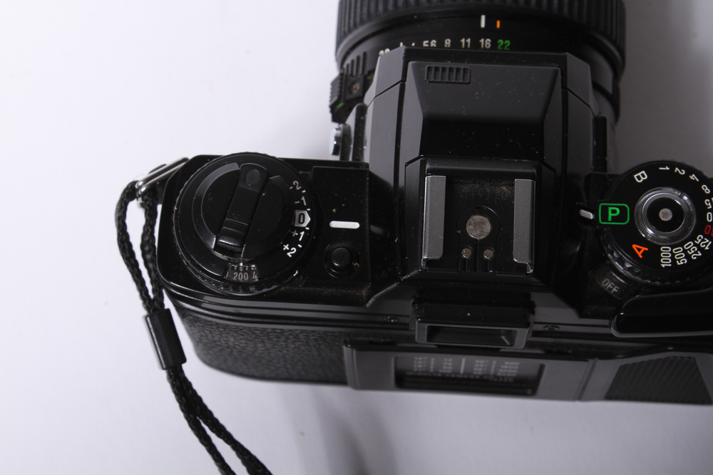 Minolta X-700 SLR Camera With Tripod