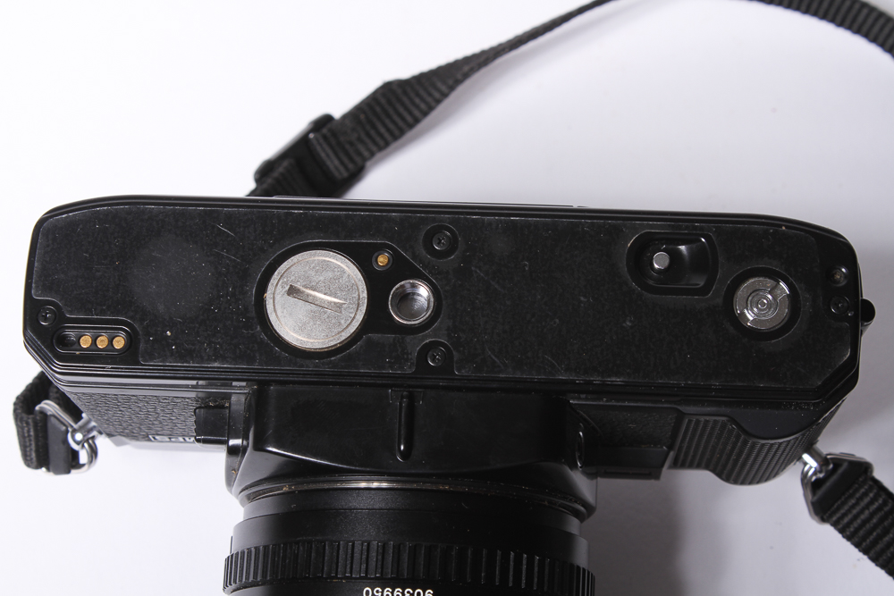 Minolta X-700 SLR Camera With Tripod