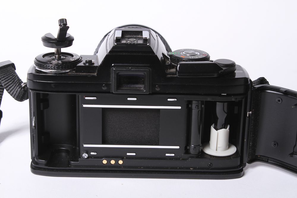 Minolta X-700 SLR Camera With Tripod