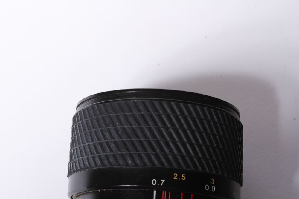 Minolta X-700 SLR Camera With Tripod