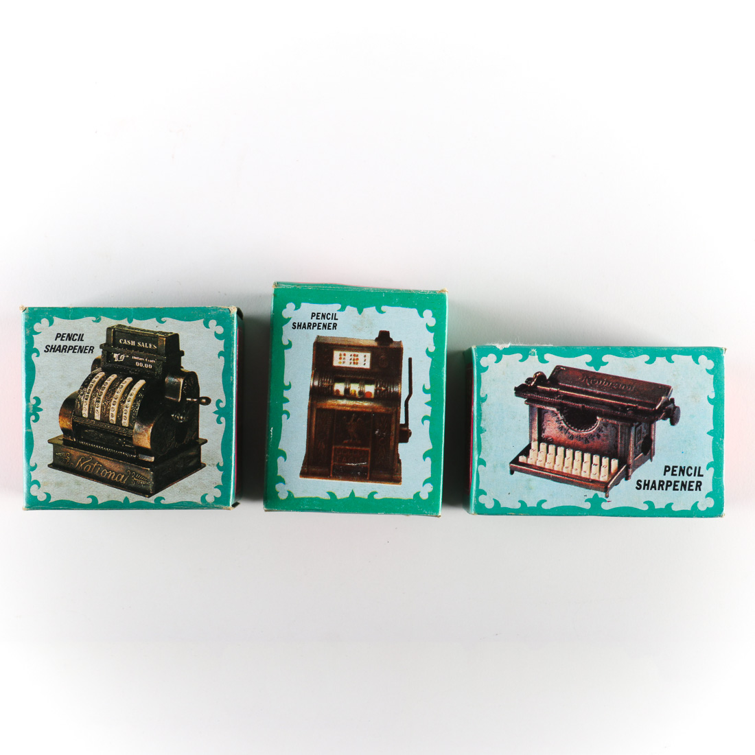 Three Vintage Die-Cast Pencil Sharpeners