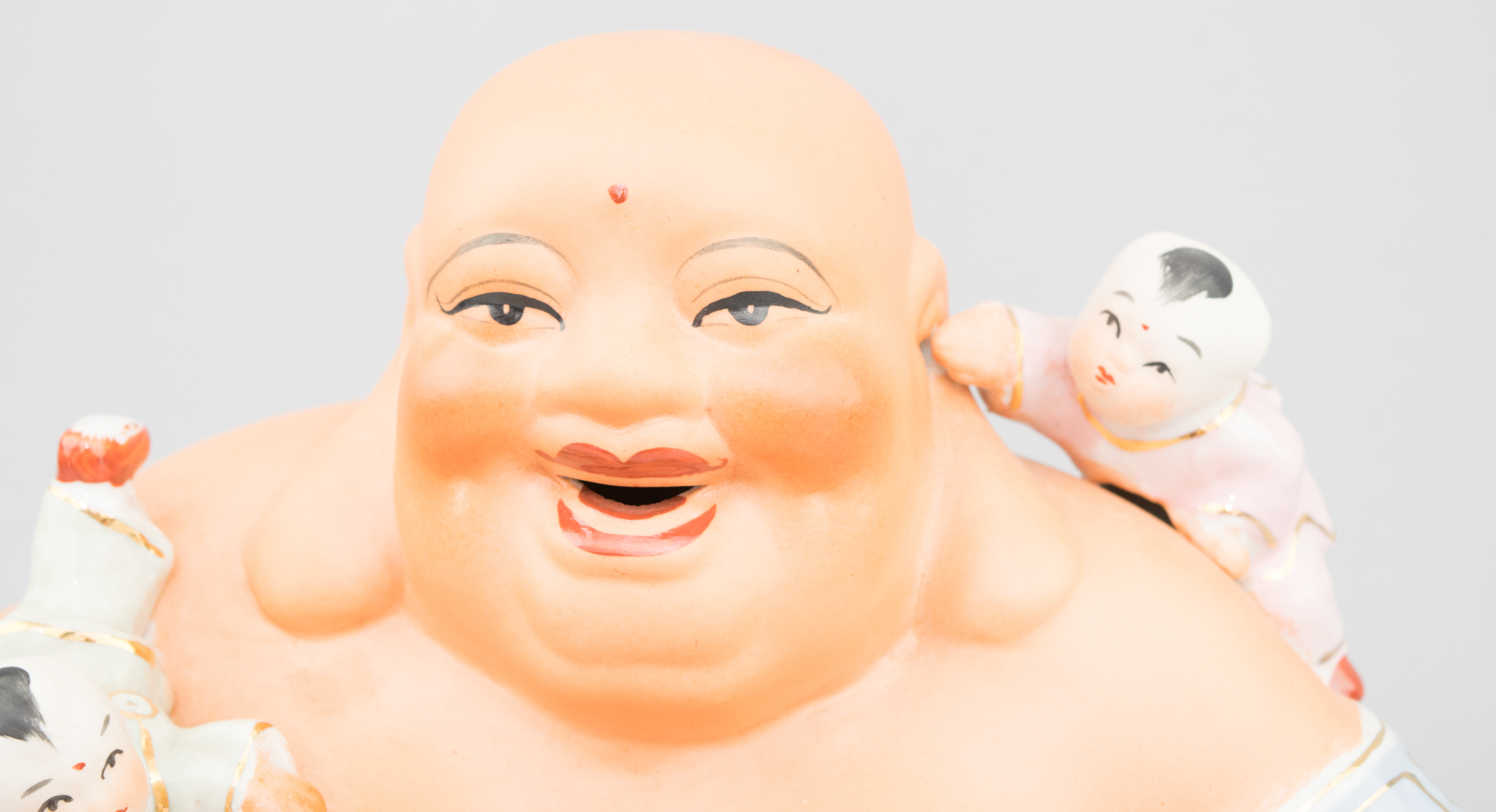 Three Happy Budai with Children Figurines