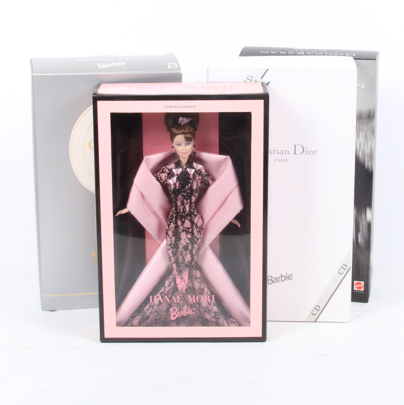 Four Limited Edition Barbie Dolls Designed by Christian Dior, Donna Karan, and Hanae Mori