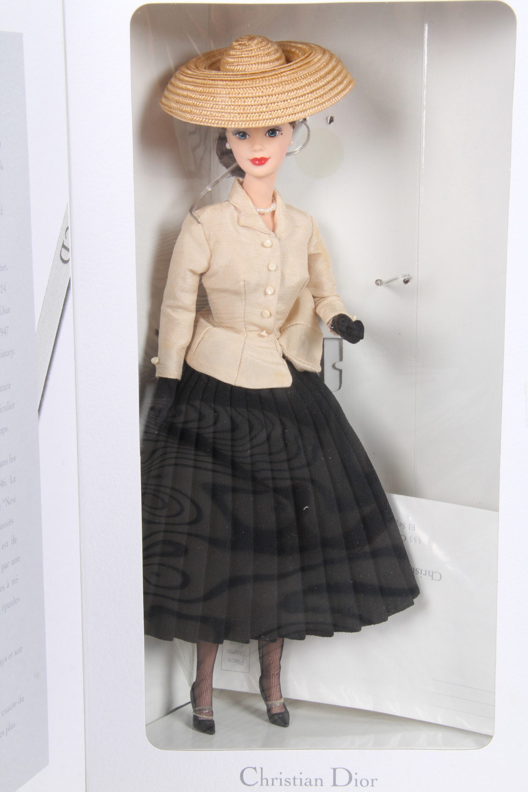 Four Limited Edition Barbie Dolls Designed by Christian Dior, Donna Karan, and Hanae Mori