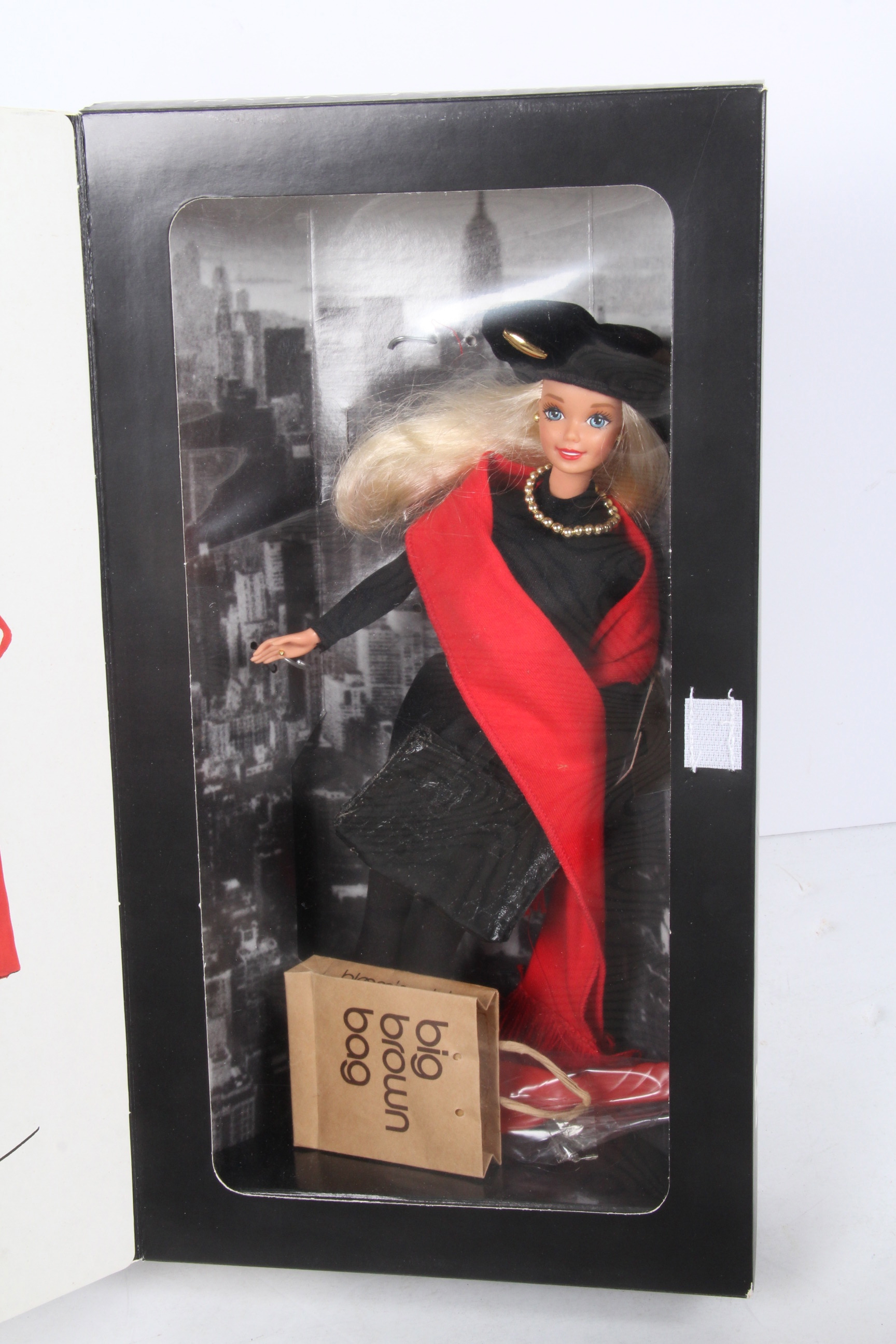 Four Limited Edition Barbie Dolls Designed by Christian Dior, Donna Karan, and Hanae Mori