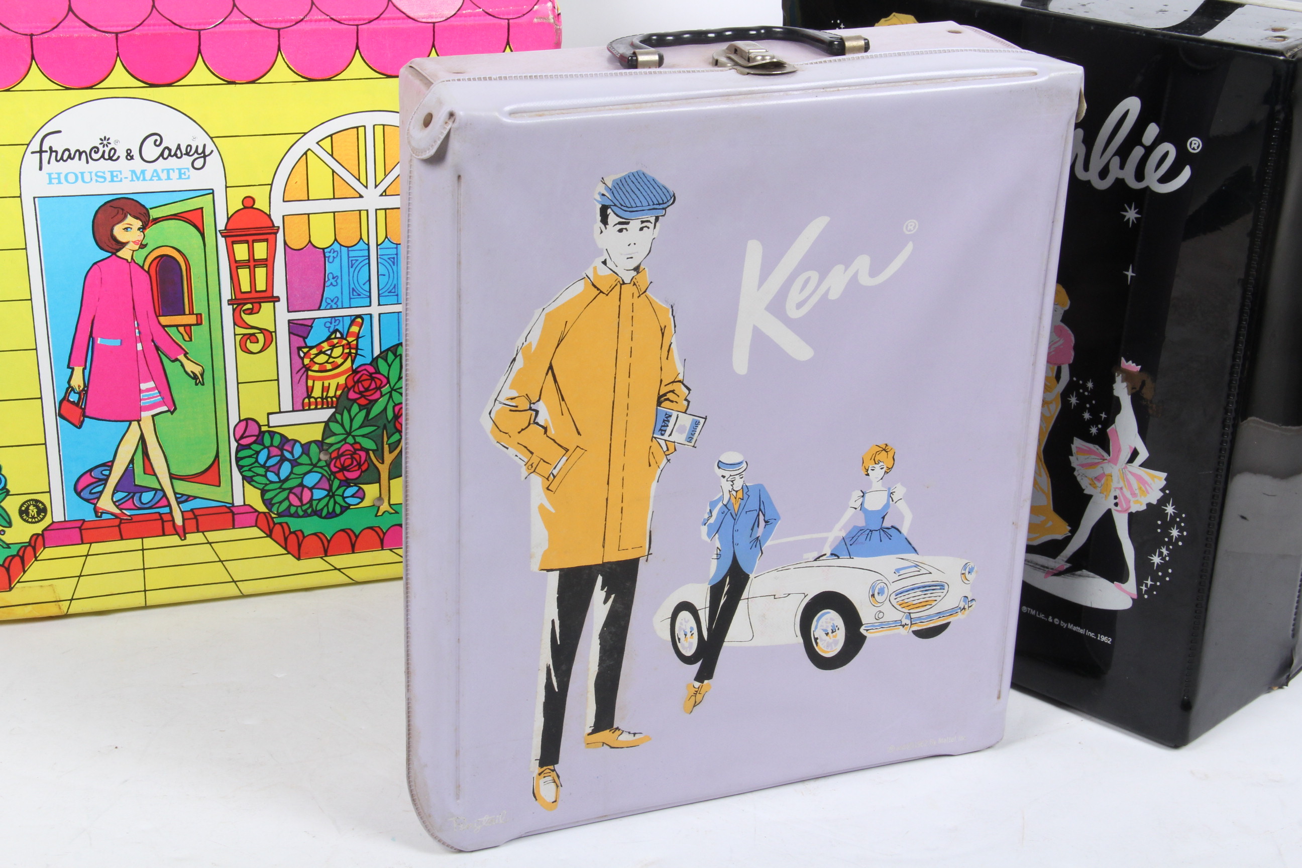 Barbie Carrying Cases, Ken Carrying Case, and "Francie and Casey House Mate" Carrying Case