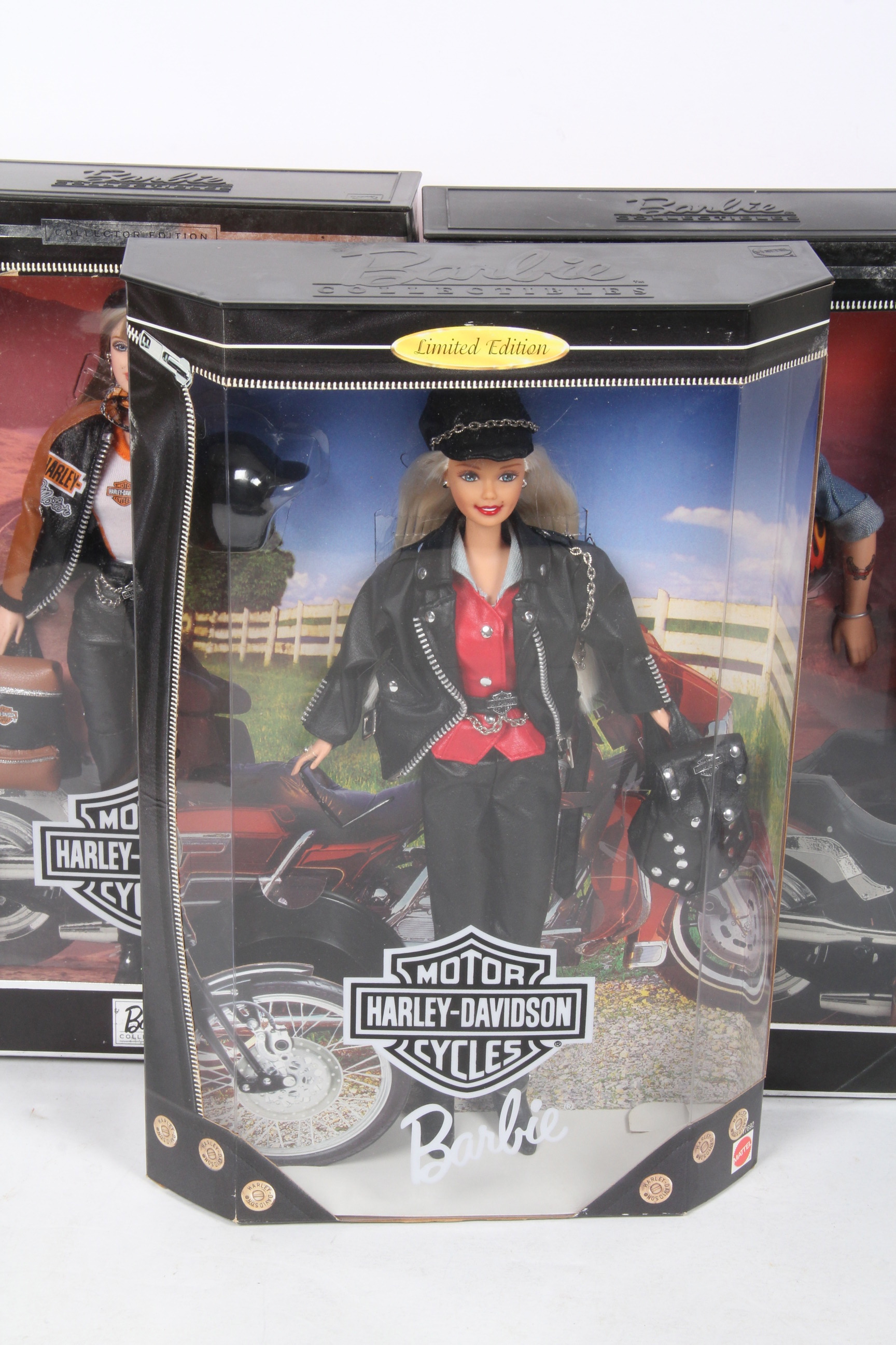 Collection of Harley-Davidson Barbie and Ken Dolls