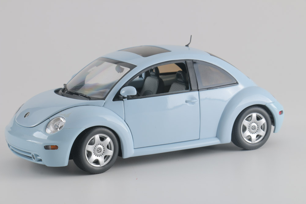 Assortment of Five Modern Volkswagen Beetle Die-Cast Cars