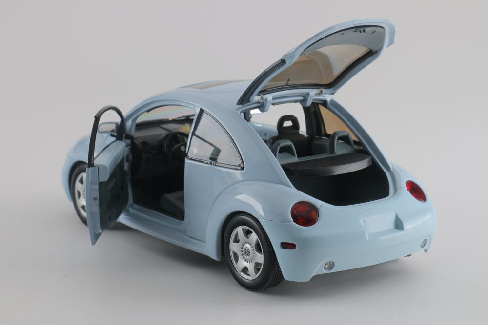 Assortment of Five Modern Volkswagen Beetle Die-Cast Cars