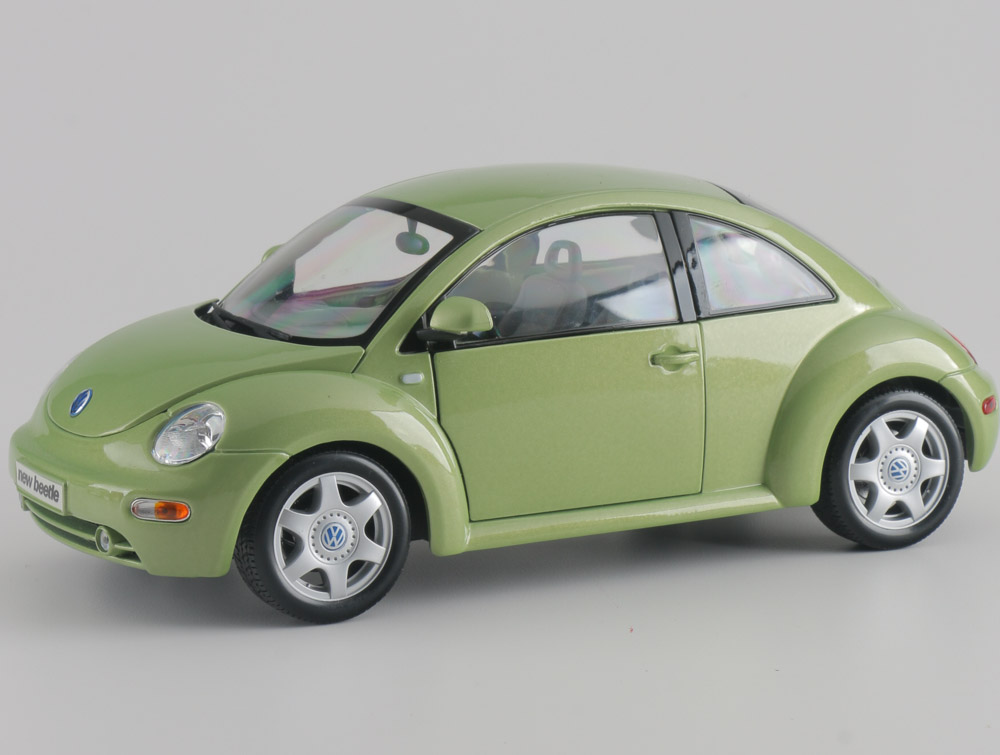 Assortment of Five Modern Volkswagen Beetle Die-Cast Cars