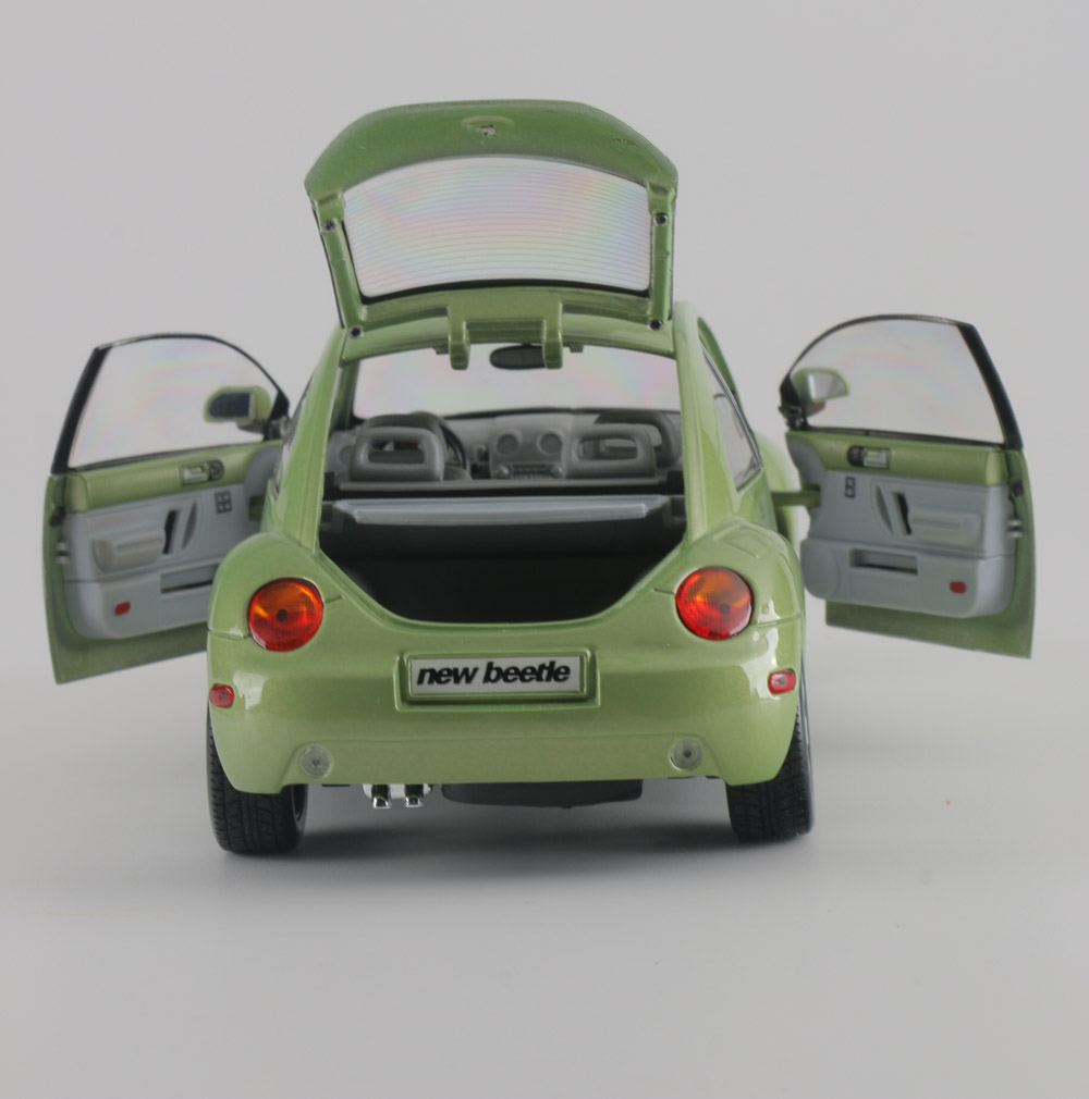 Assortment of Five Modern Volkswagen Beetle Die-Cast Cars