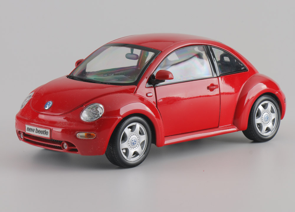 Assortment of Five Modern Volkswagen Beetle Die-Cast Cars