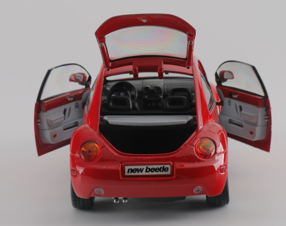 Assortment of Five Modern Volkswagen Beetle Die-Cast Cars