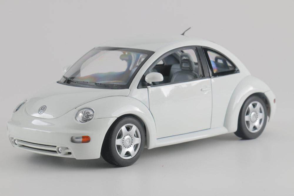 Assortment of Five Modern Volkswagen Beetle Die-Cast Cars