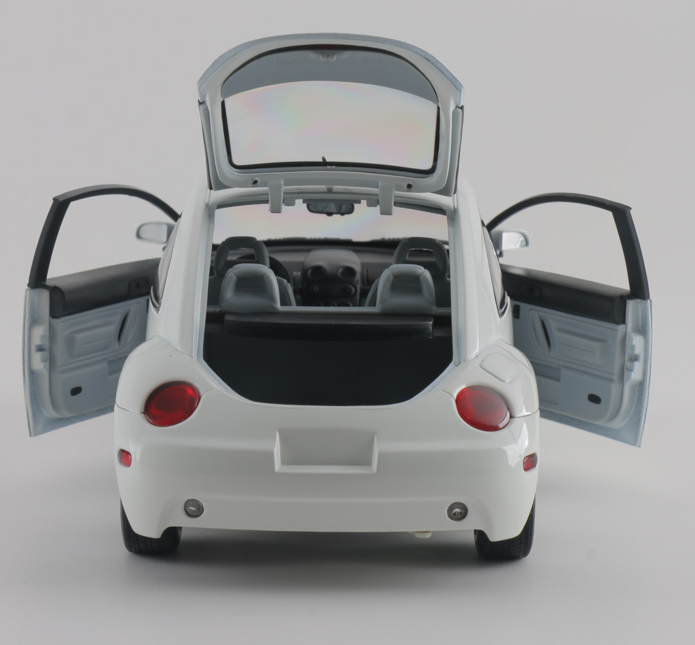 Assortment of Five Modern Volkswagen Beetle Die-Cast Cars