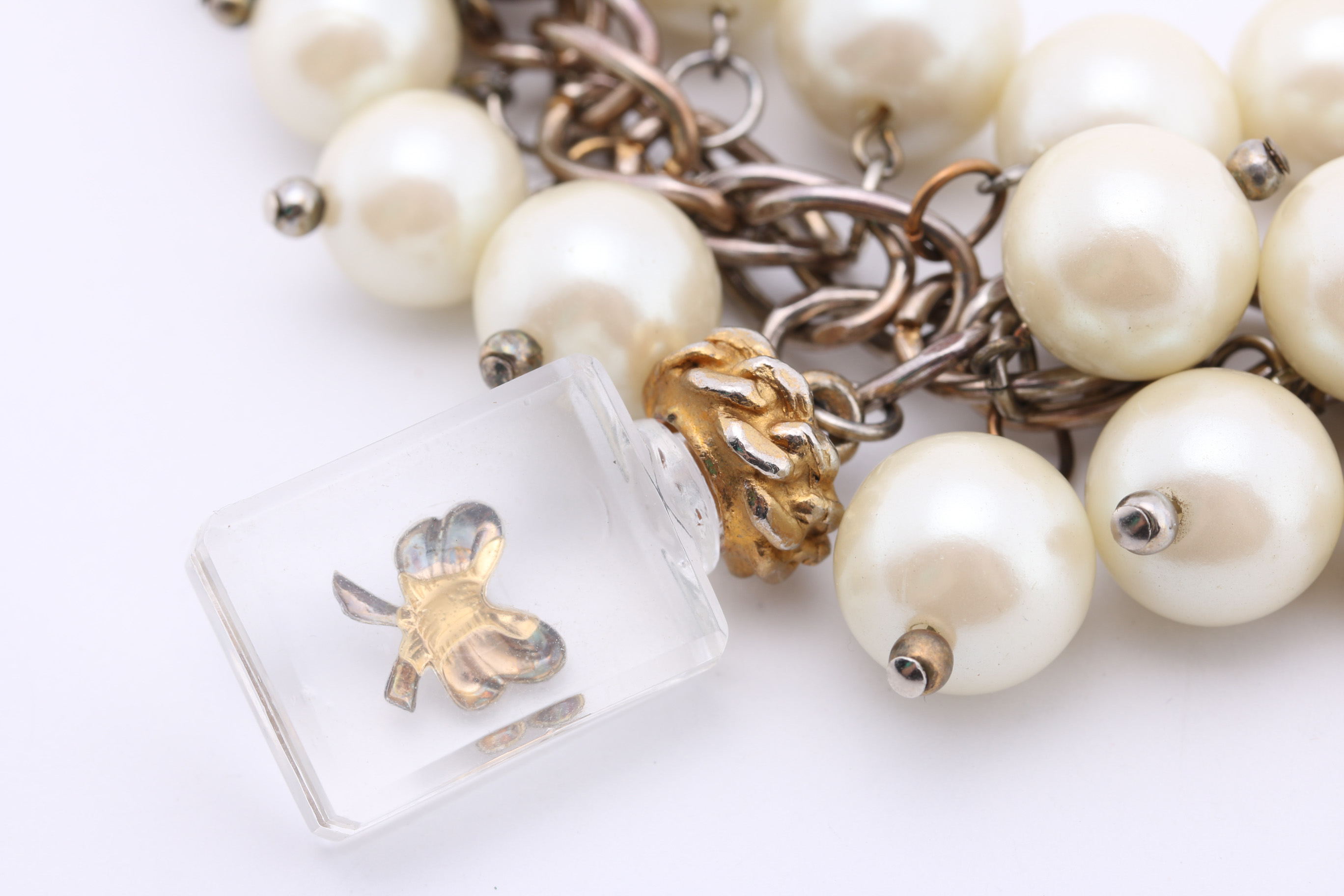 Faux Stone and Reproduction Coin Charm Bracelets Circa 1950