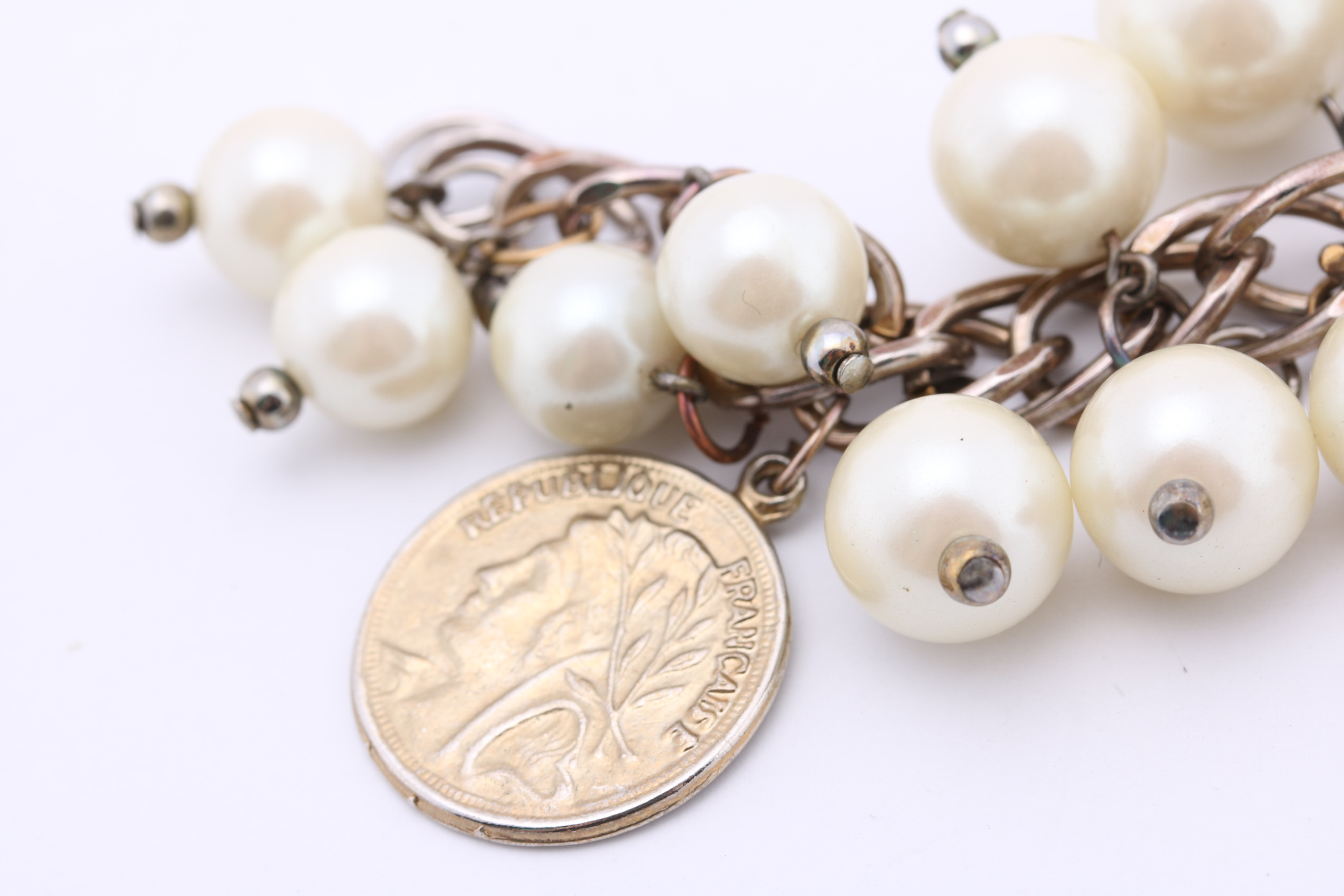 Faux Stone and Reproduction Coin Charm Bracelets Circa 1950