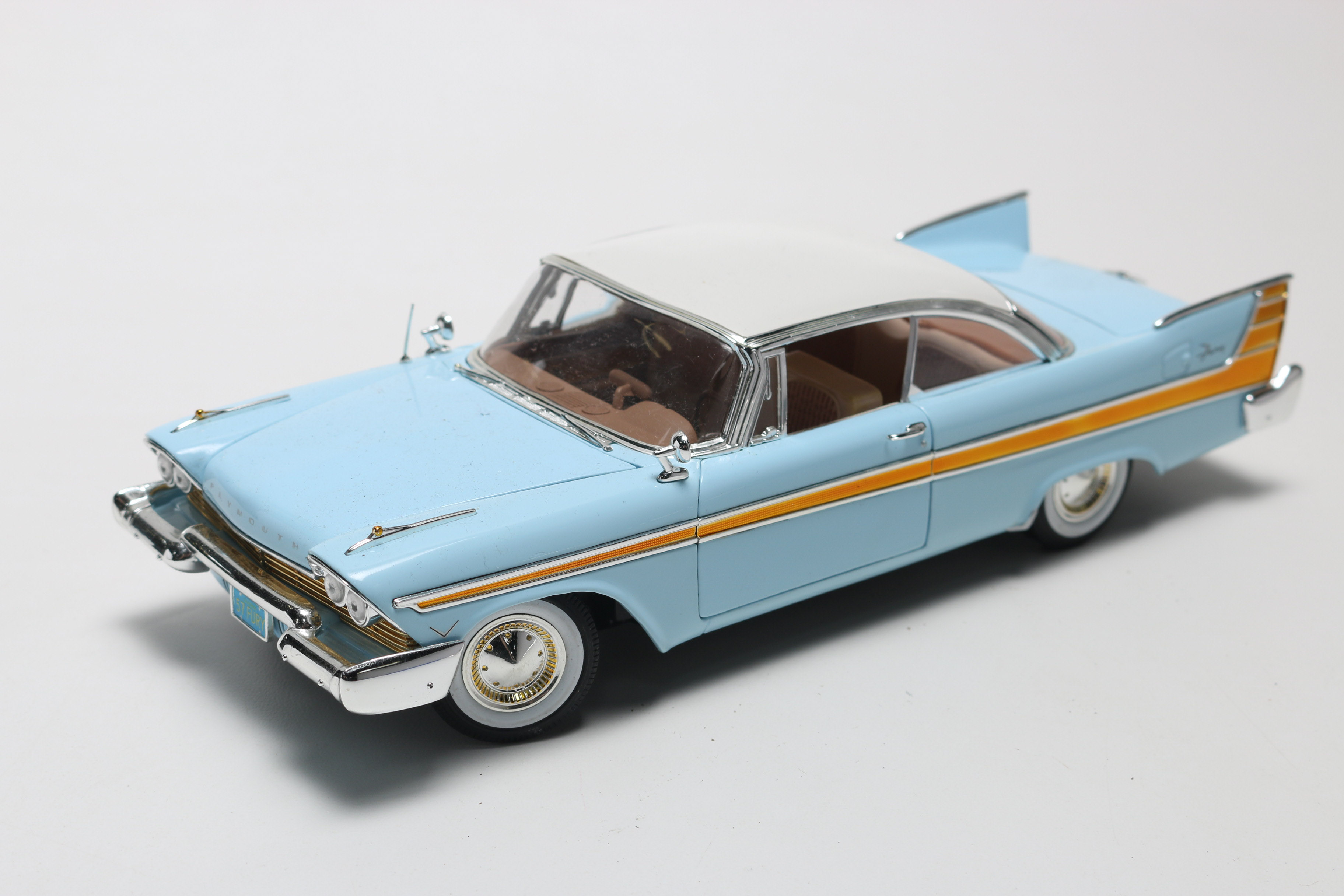 Three Die-Cast 1950s Plymouth Model Cars, One Limited Edition