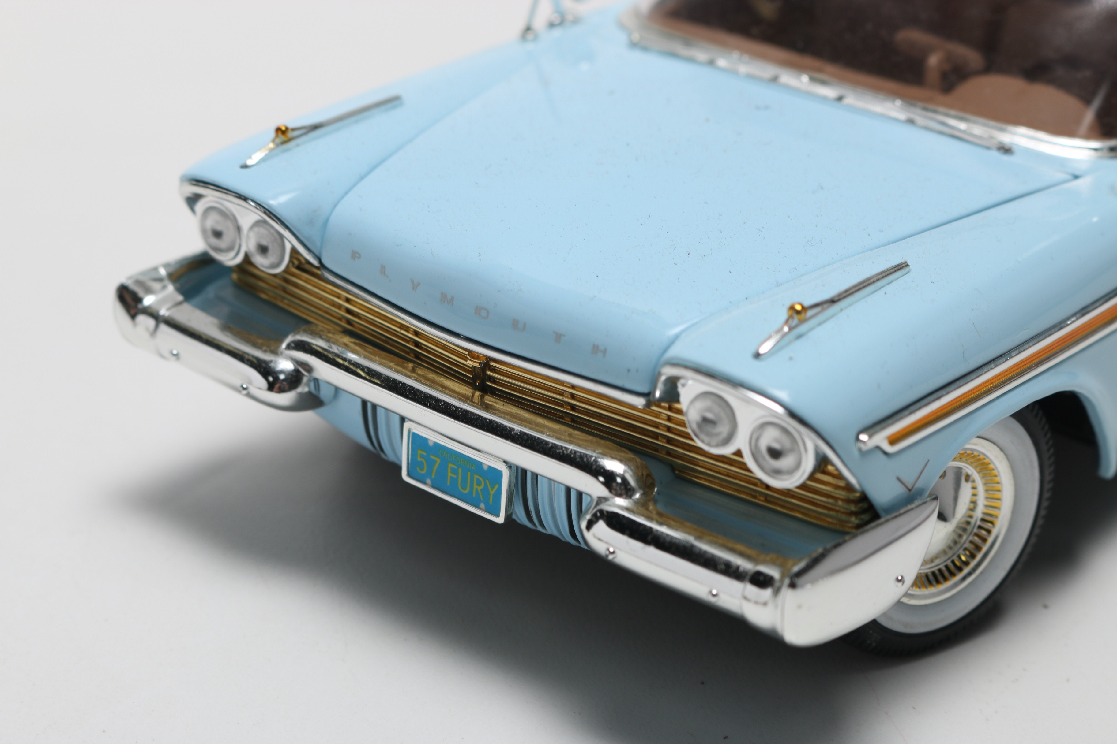 Three Die-Cast 1950s Plymouth Model Cars, One Limited Edition