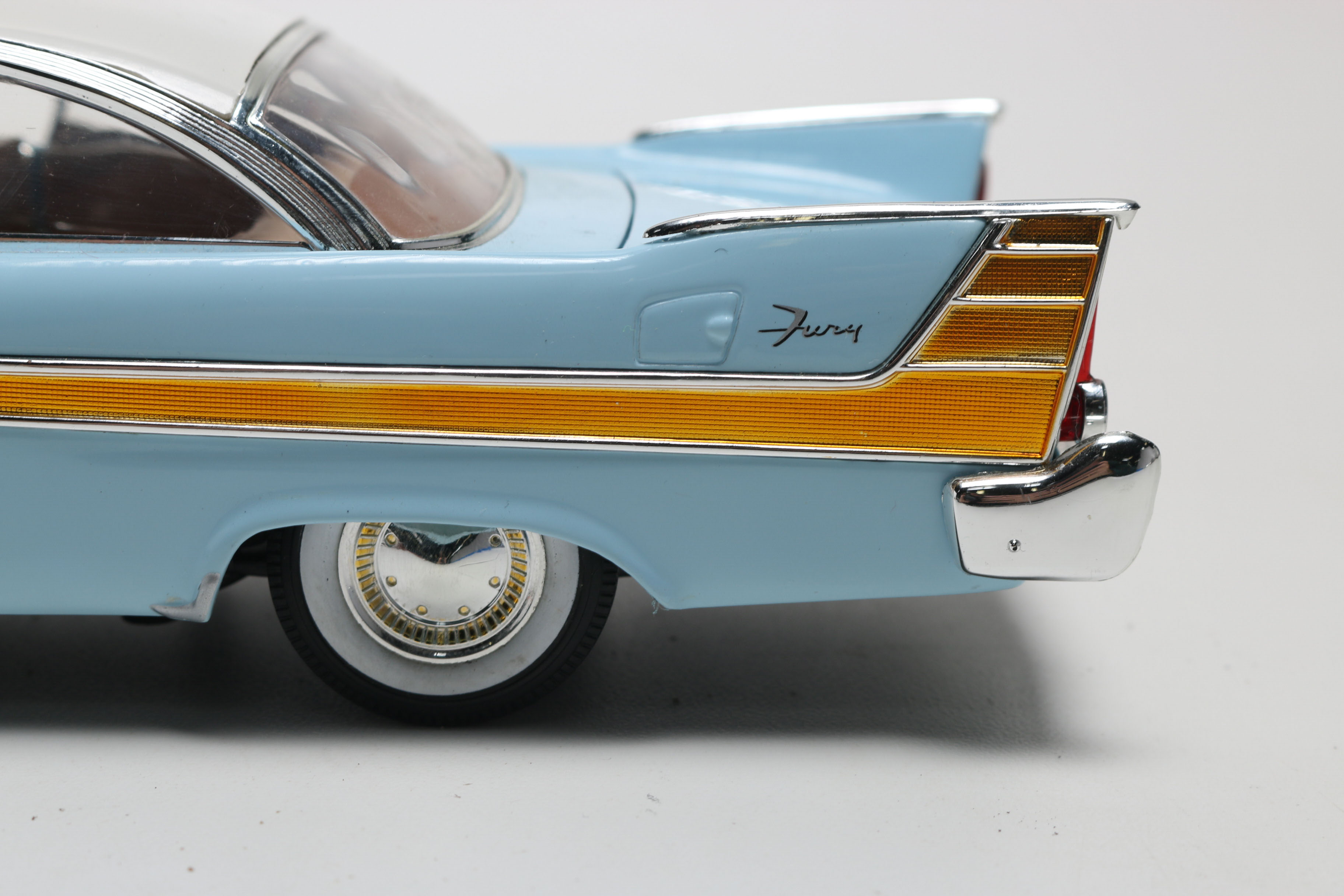 Three Die-Cast 1950s Plymouth Model Cars, One Limited Edition