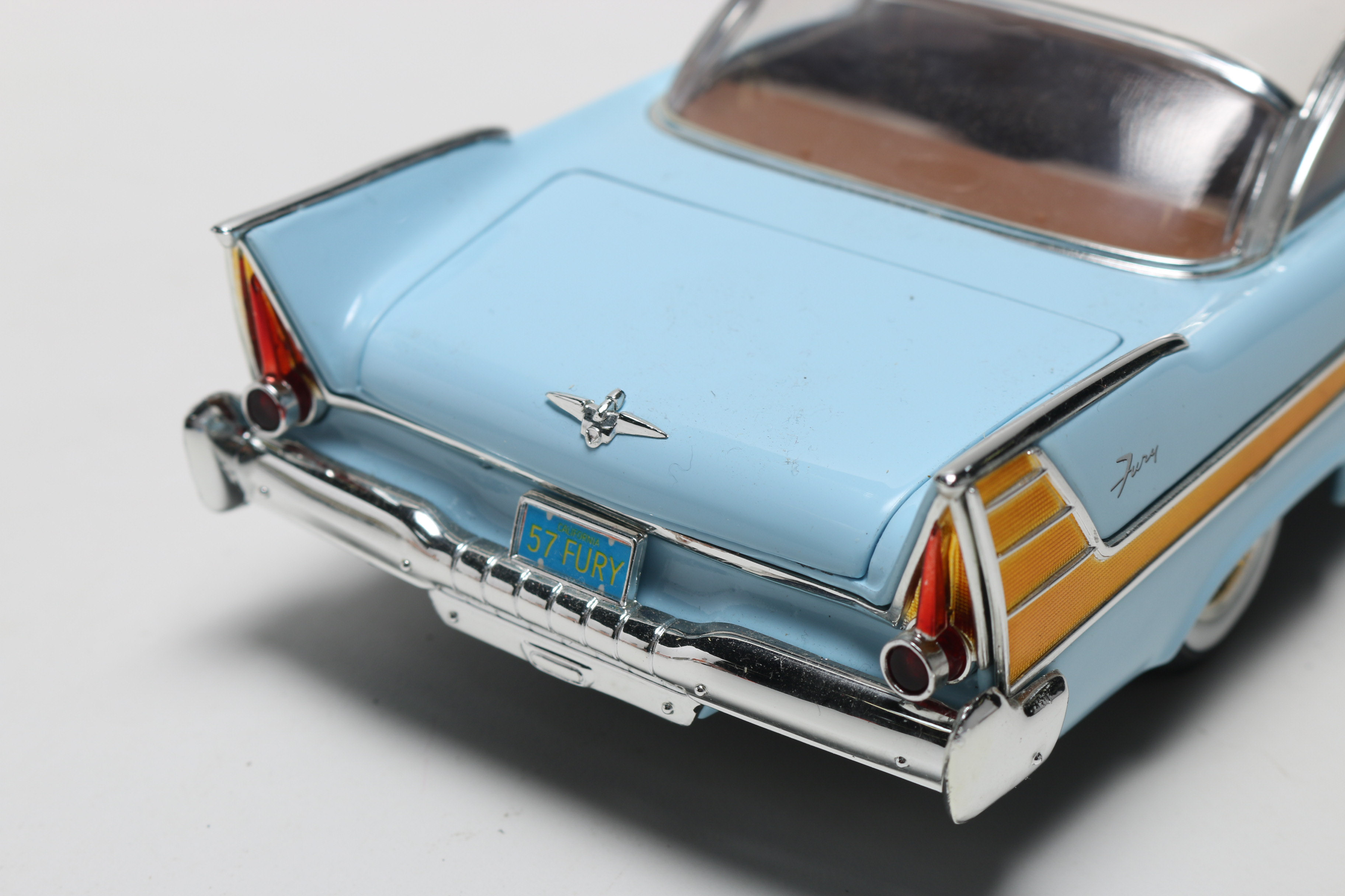 Three Die-Cast 1950s Plymouth Model Cars, One Limited Edition