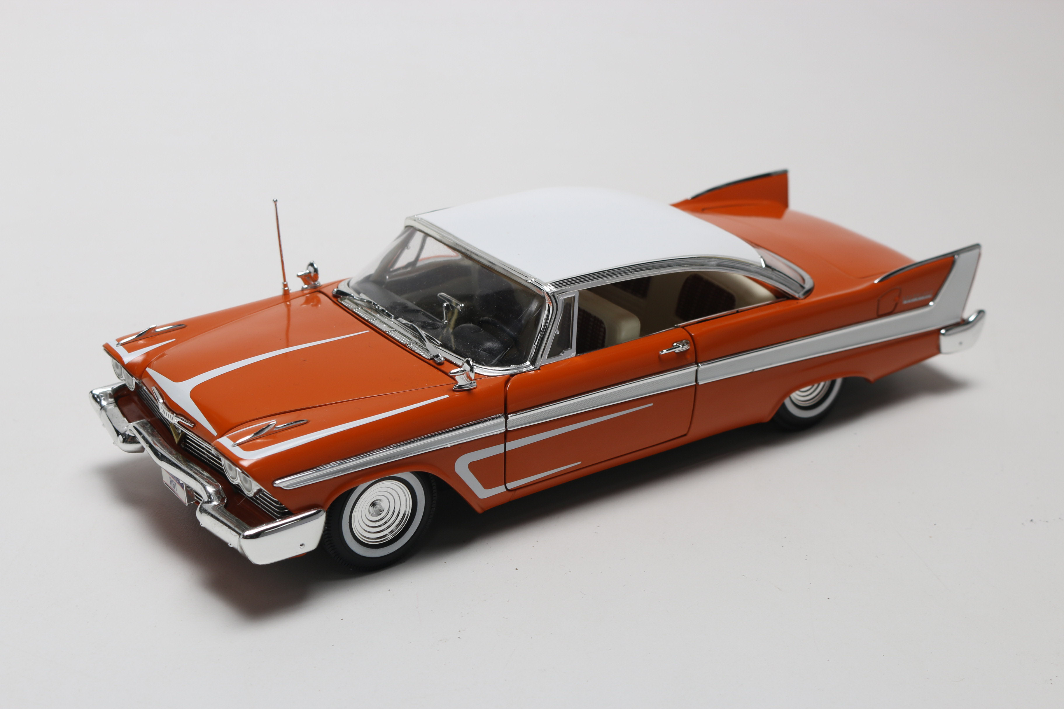 Three Die-Cast 1950s Plymouth Model Cars, One Limited Edition