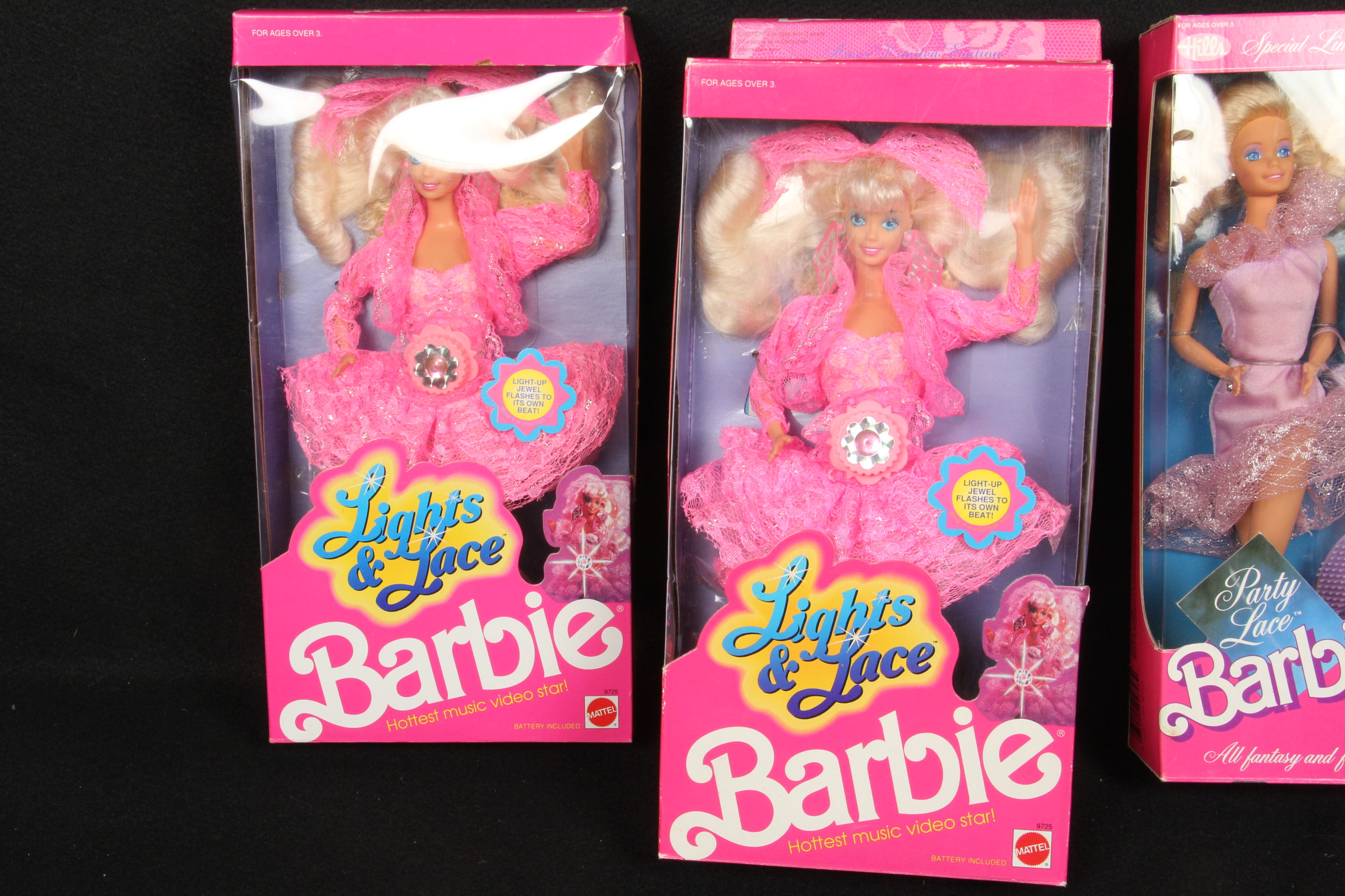 Collection of Barbie Dolls with a Lace Motif
