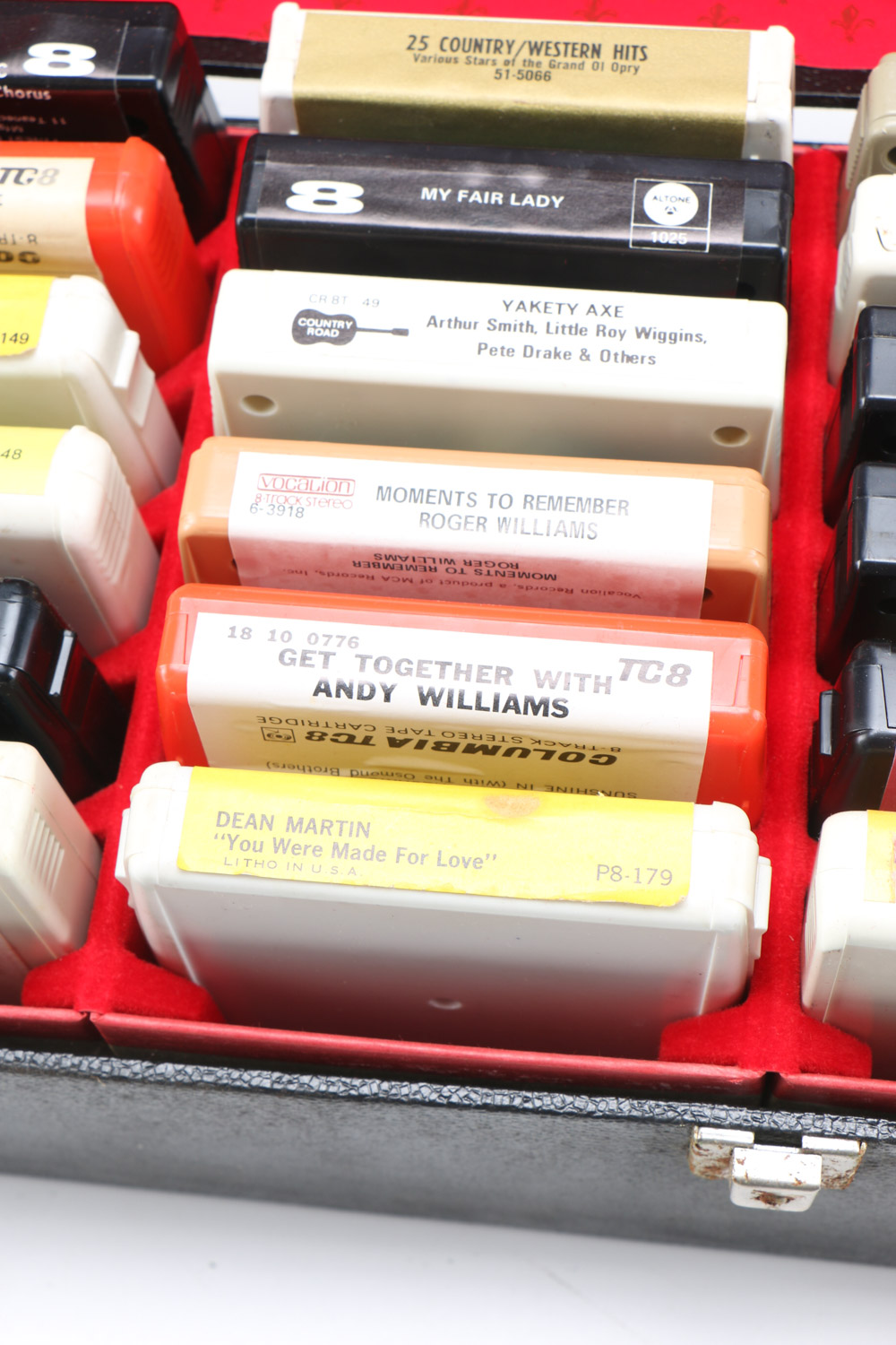 Vintage 8-Track Cassette Tapes with Storage Cases