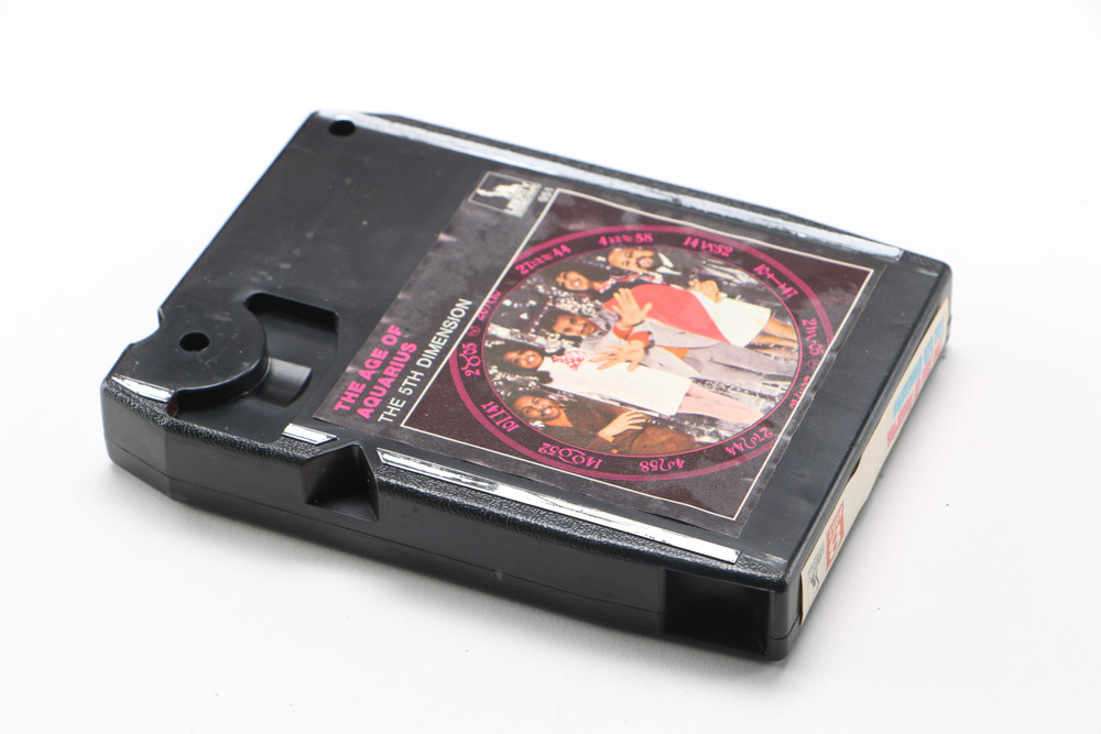 Vintage 8-Track Cassette Tapes with Storage Cases