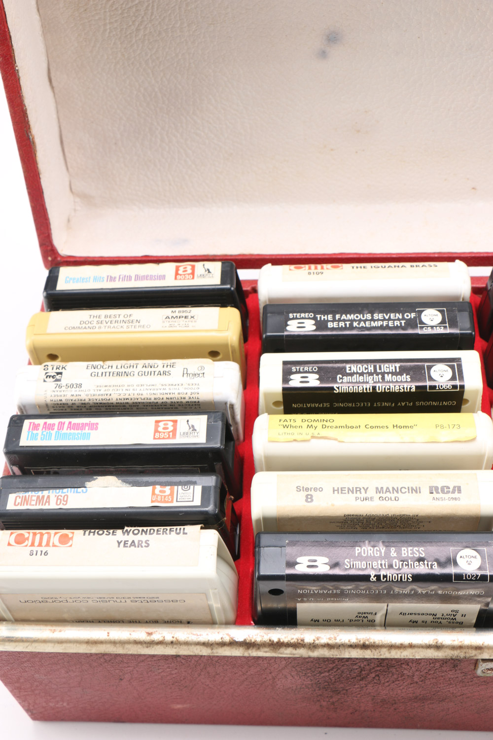 Vintage 8-Track Cassette Tapes with Storage Cases
