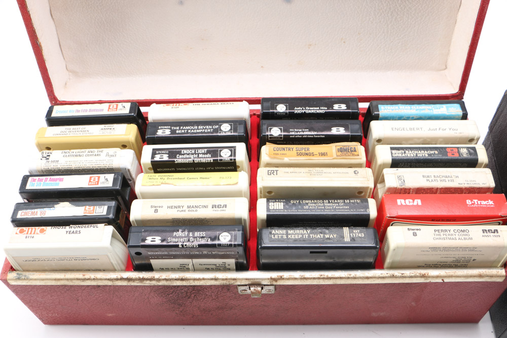 Vintage 8-Track Cassette Tapes with Storage Cases