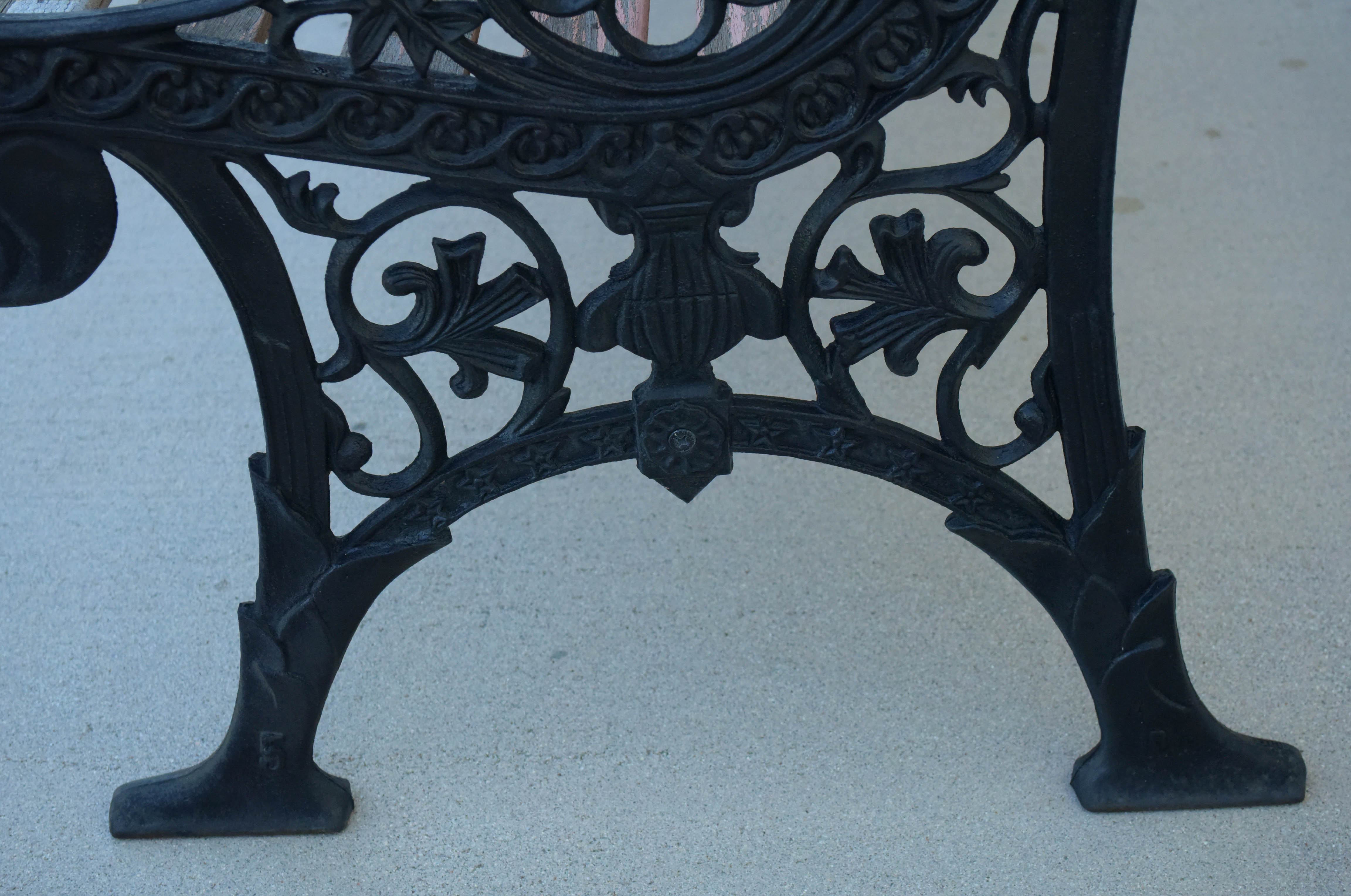 Black Wrought Iron and Wooden Garden Benches