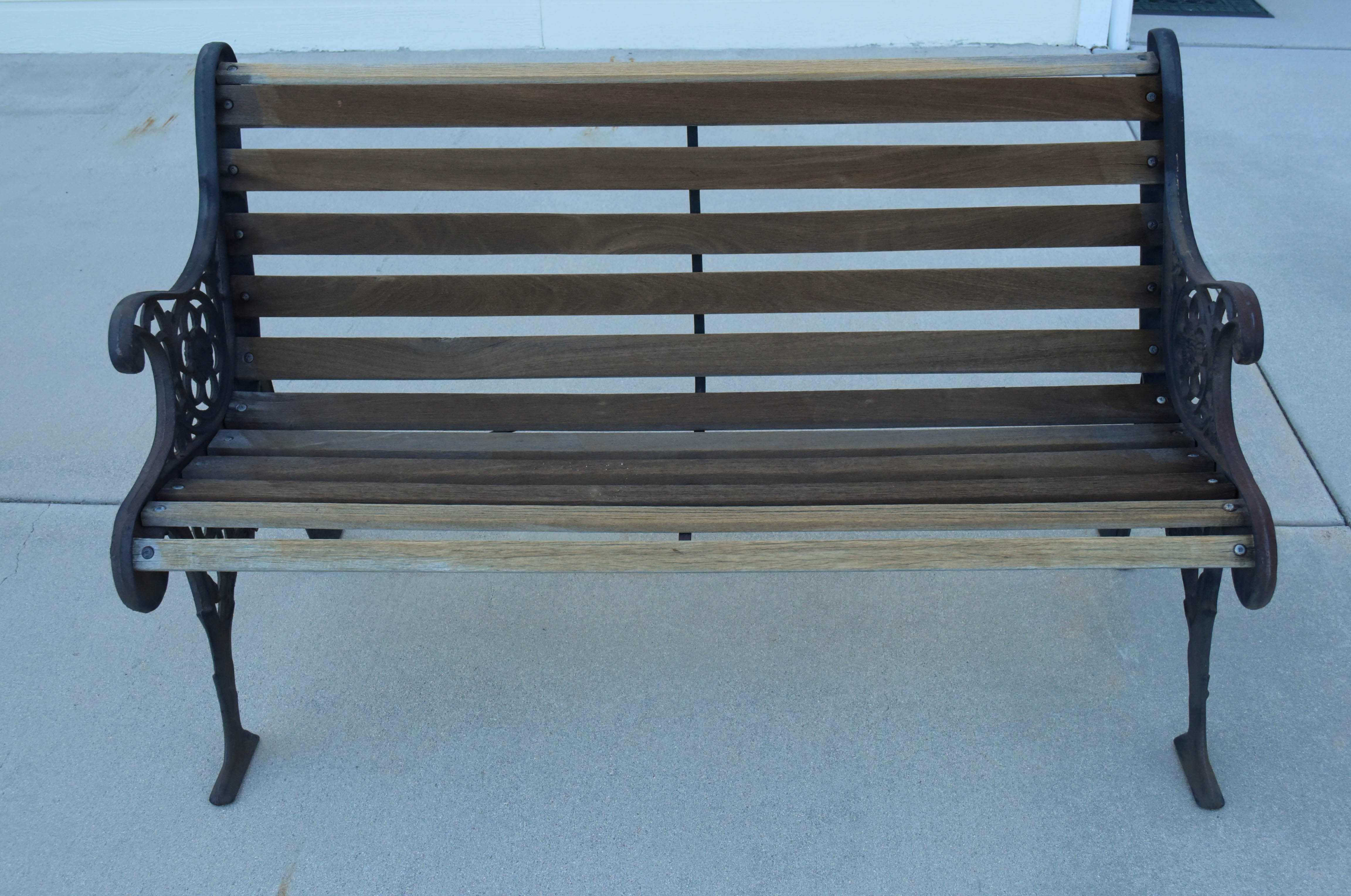 Black Wrought Iron and Wooden Garden Benches